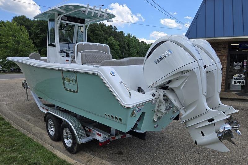 2027 Sea Hunt Ultra 275 SE boat with dual Yamaha engines on a trailer.