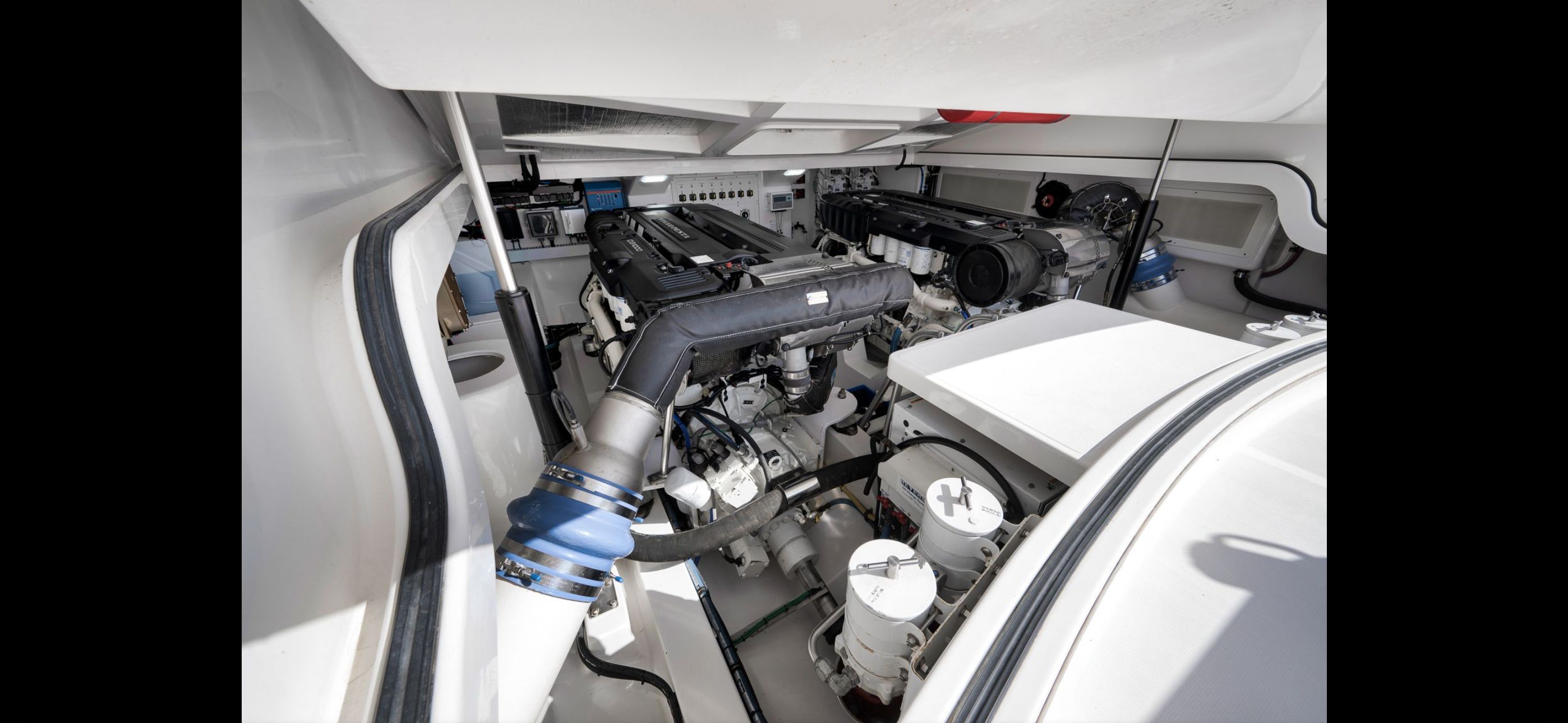 Engine room of 2022 Mag Bay 42 Express with dual engines.
