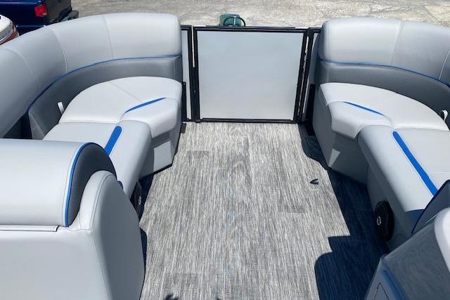 Interior of a 2026 Bentley Pontoons Bolt with gray and blue seating.