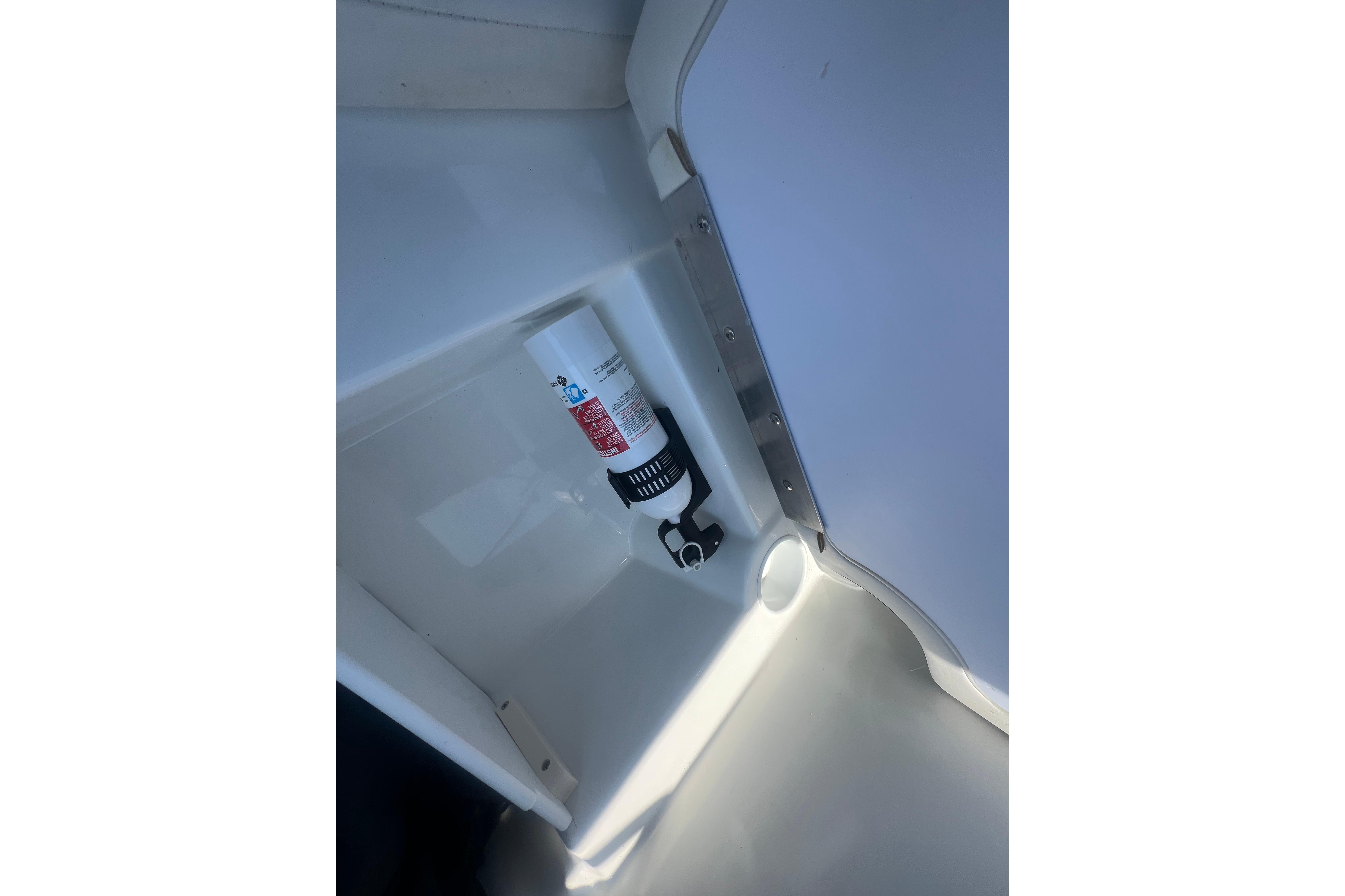 2023 Tahoe T16 boat interior with mounted fire extinguisher.