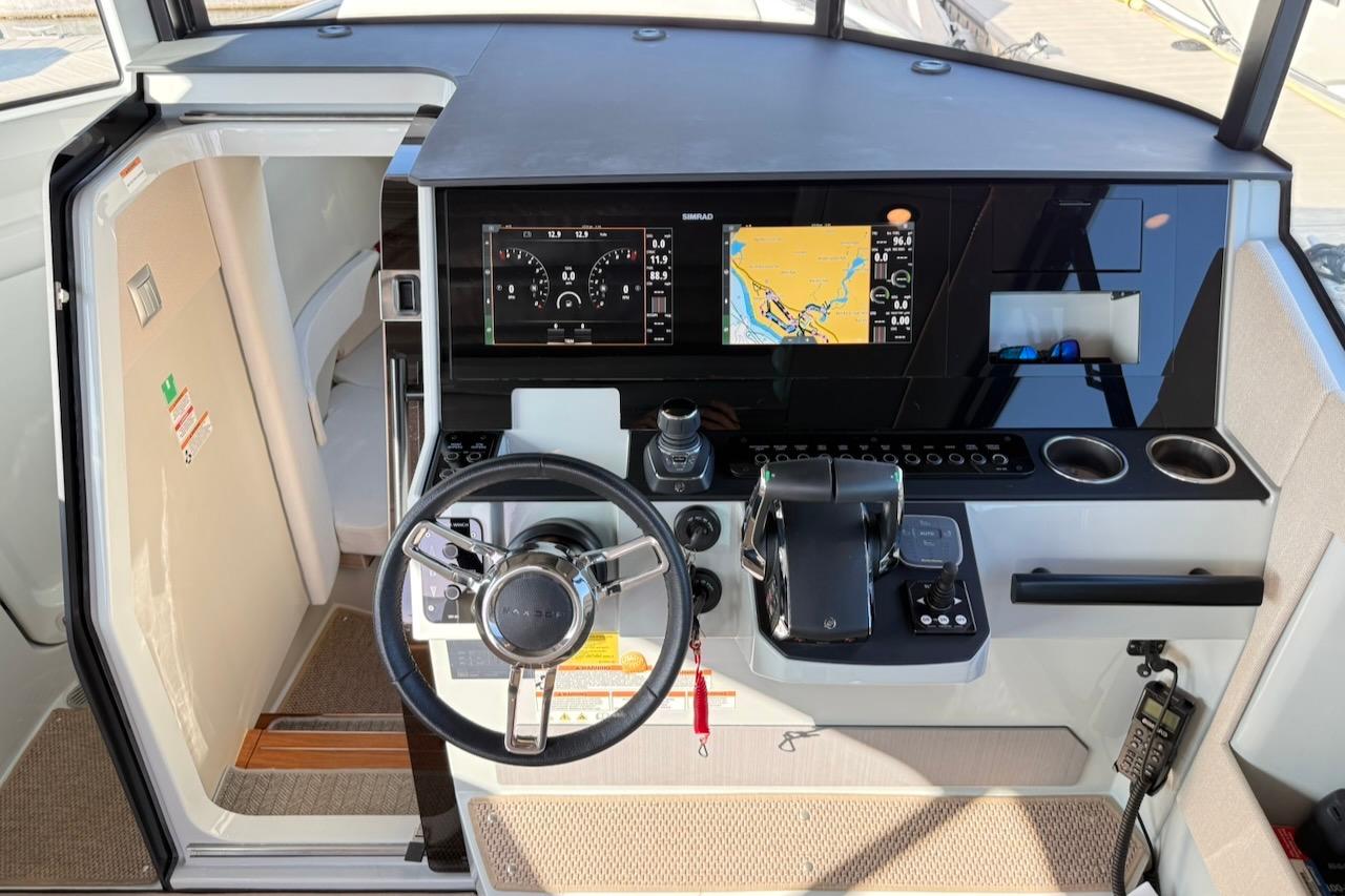 2024 Saxdor 320 GTC helm with modern navigation display and controls.