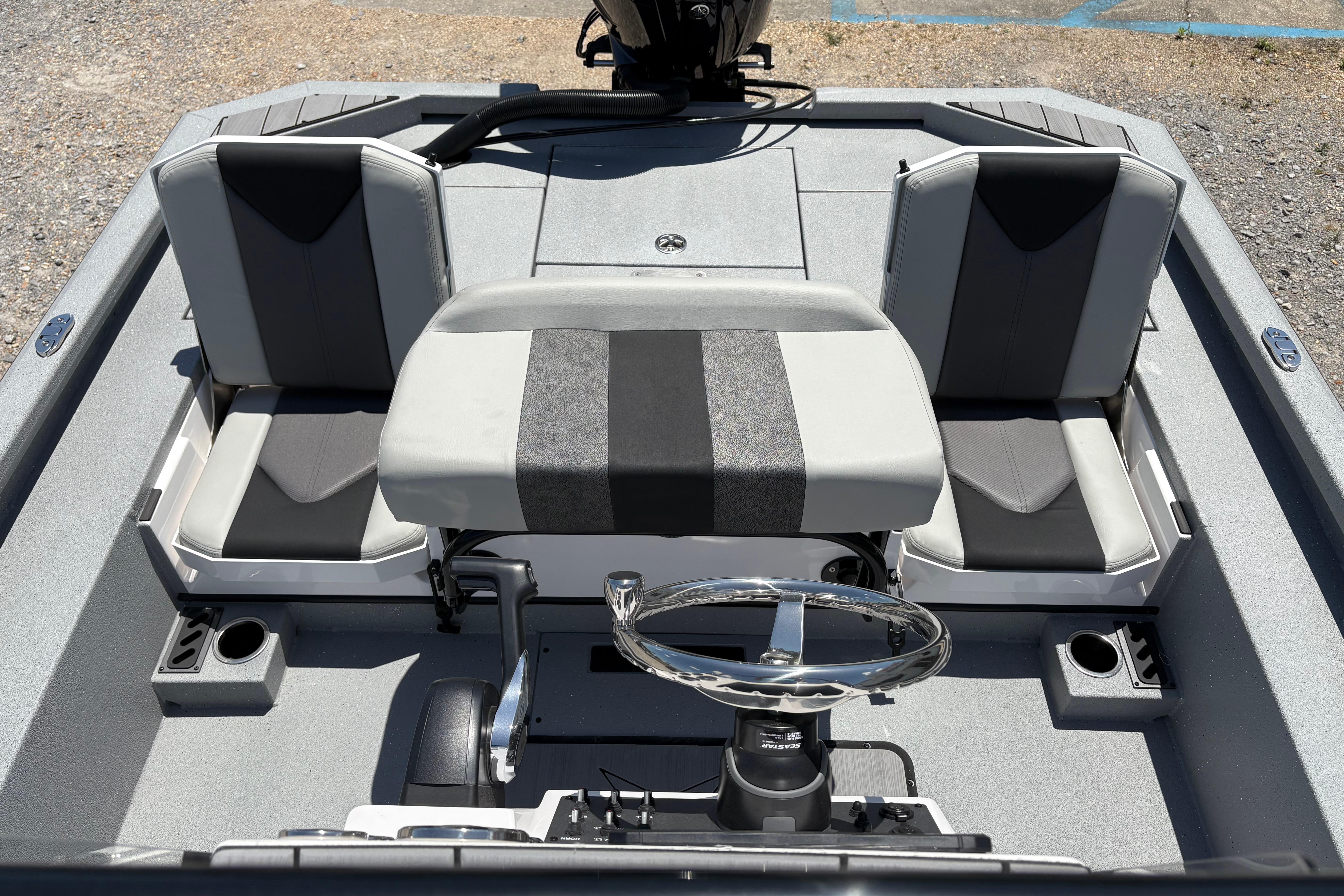 2026 Vexus ACX 2150 boat interior with dual seats and steering wheel.
