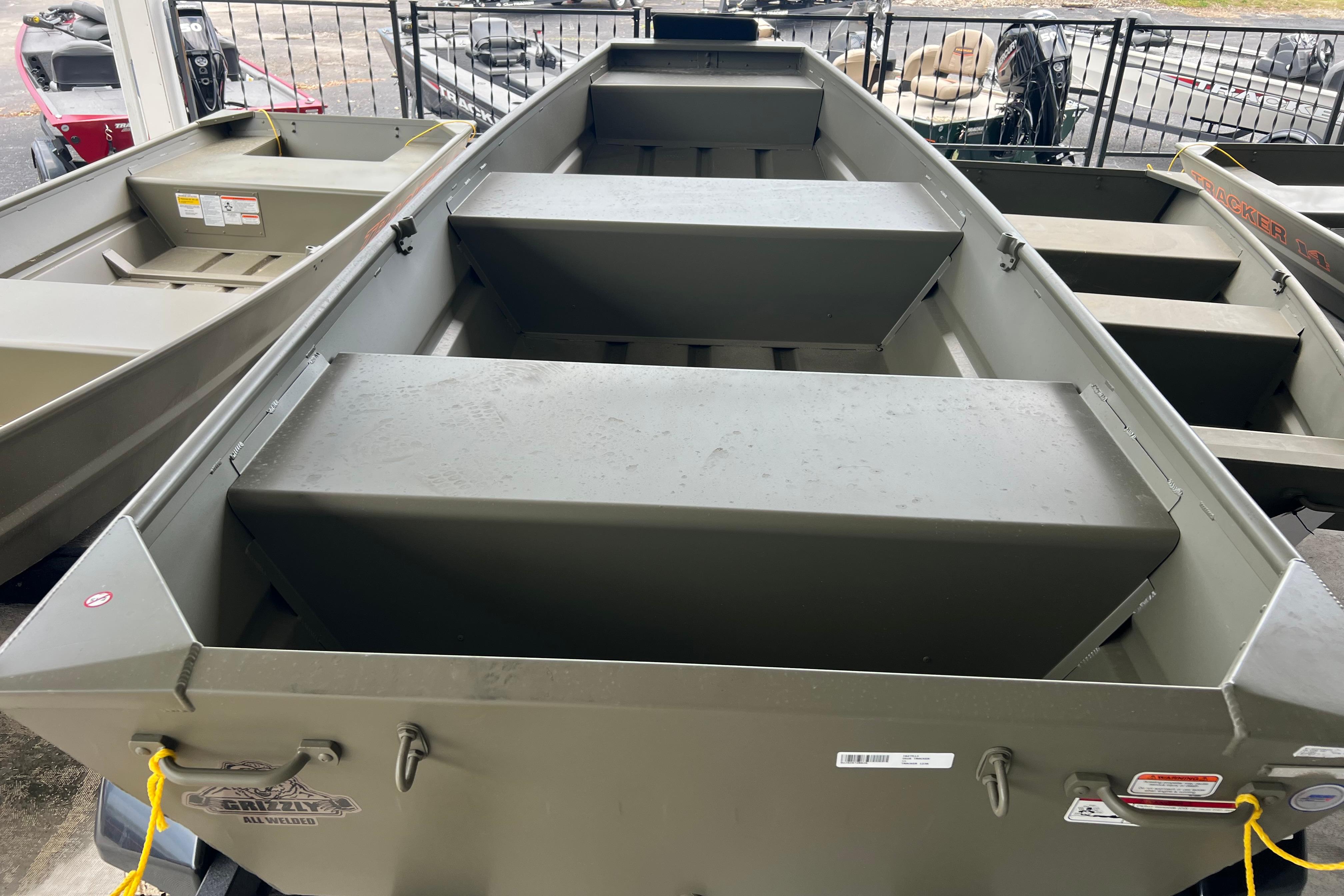 2026 Tracker Grizzly 12 Jon boat, all-welded aluminum construction, displayed outdoors.