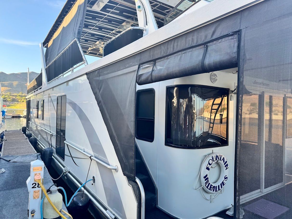 2006 Summersun Houseboats 16x68 docked at marina.