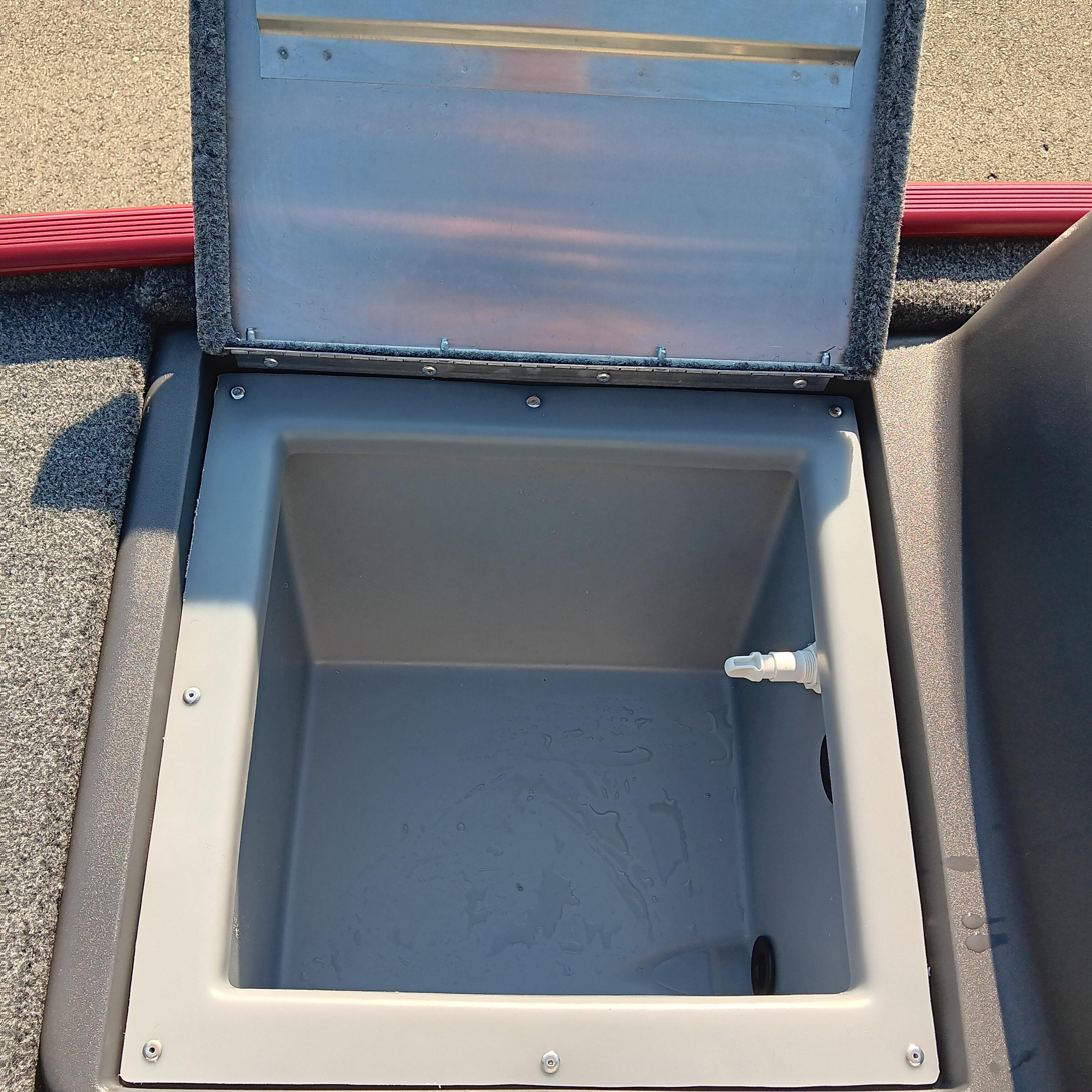 Open storage compartment in 2026 Tracker Bass Tracker Classic XL boat.
