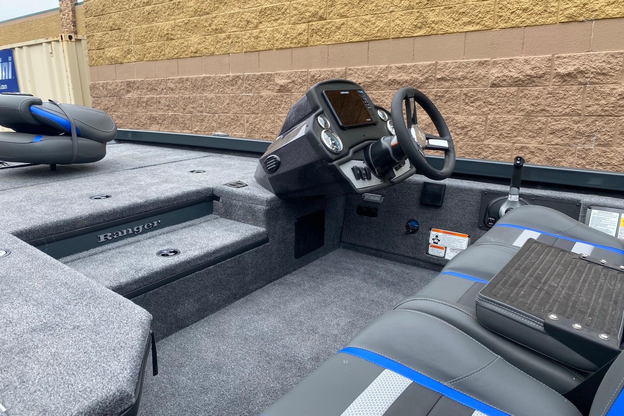 2026 Ranger RT178 boat interior with steering wheel and seating.