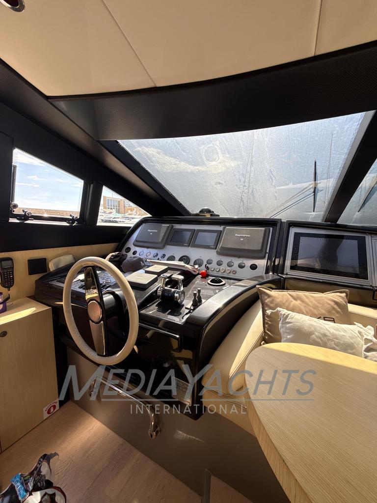 Luxurious 2007 Riva Venere 75 yacht cockpit with modern controls and plush seating.