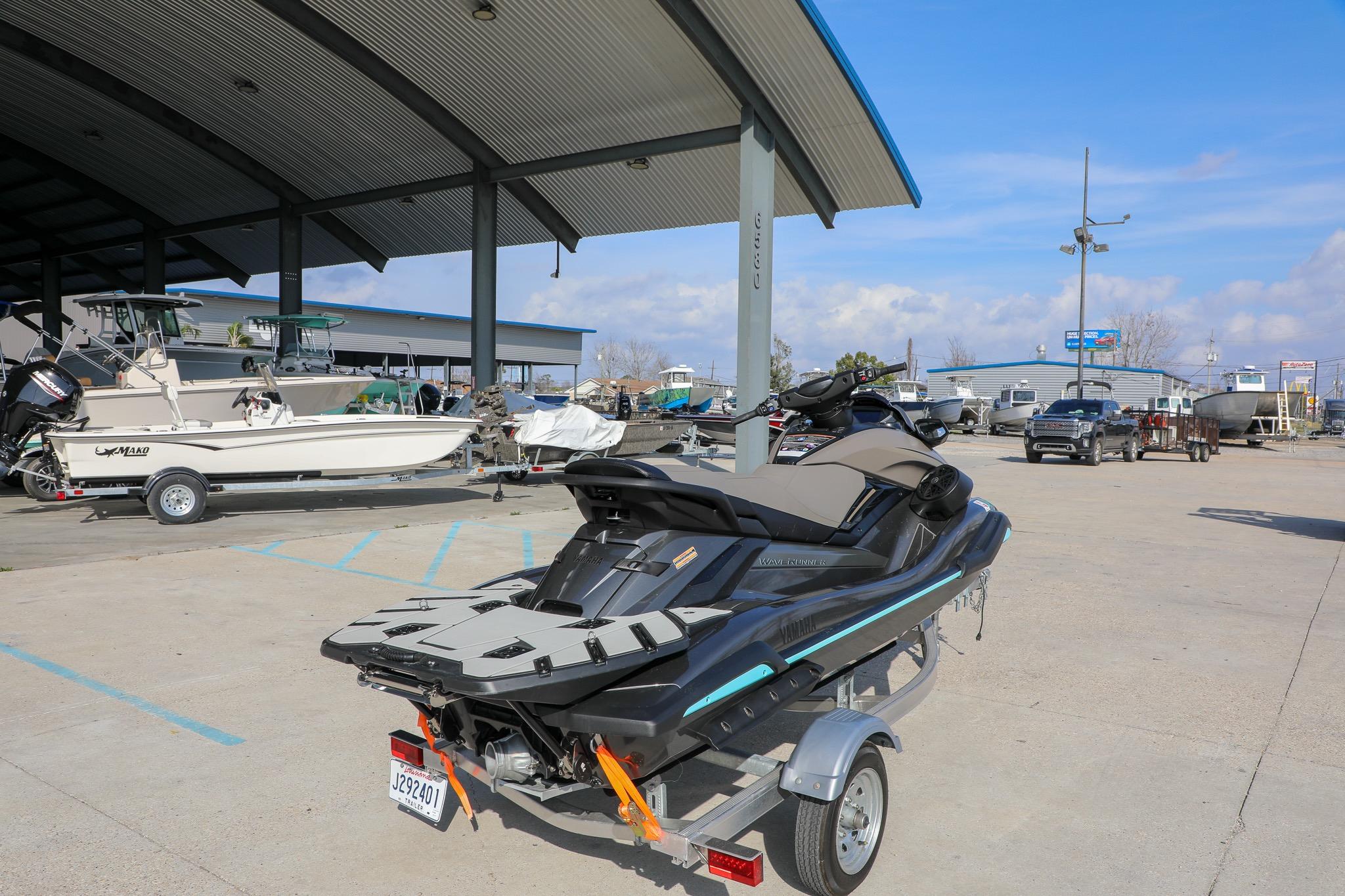 2025 Yamaha WaveRunner FX HO on trailer at a boat dealership.