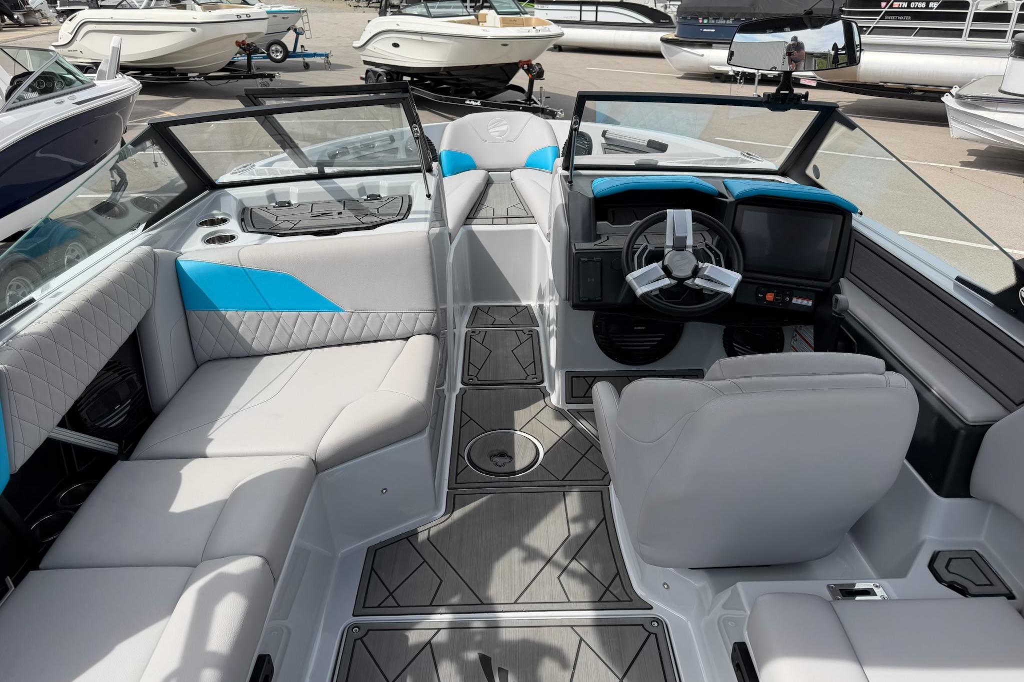 2024 Tigé Z1 boat interior with modern seating and sleek dashboard design.