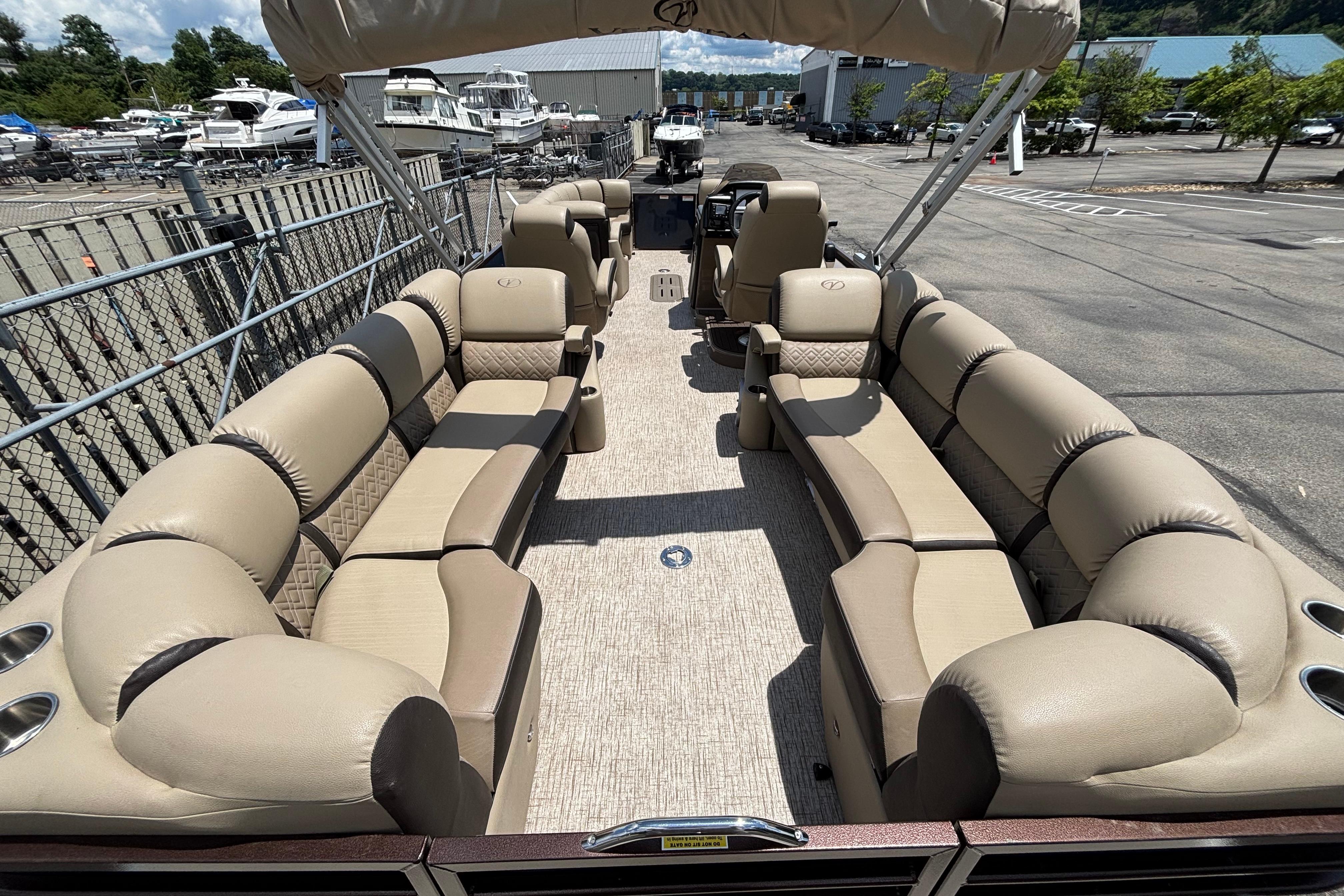 Luxurious 2021 Veranda VP25RC pontoon boat with spacious seating and elegant design.