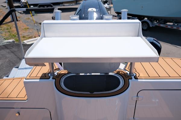Makaira Gen3 800 boat, 2023 model, featuring a sleek deck and storage area.