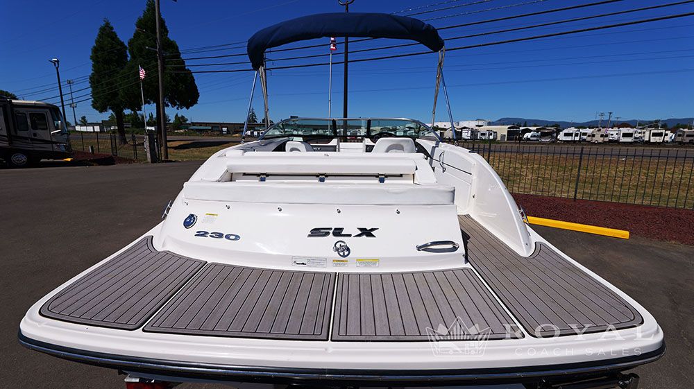 Rear view of a Sea Ray SLX 230 boat with a spacious swim platform.