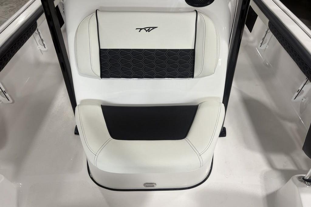 2026 Tidewater 2300 Carolina Bay boat seat with black and white upholstery design.