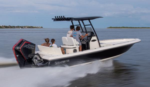 2024 ShearWater 260 Carolina Flare boat speeding on open water.