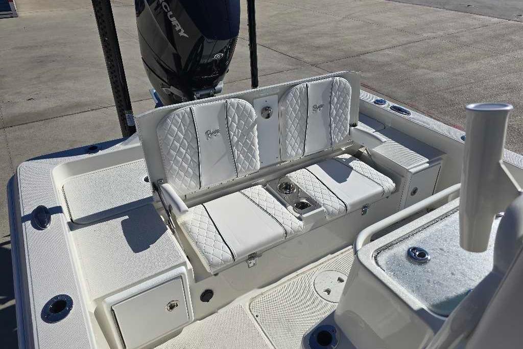 2025 Ranger 2510 Bay boat interior with white quilted seating and Mercury engine.
