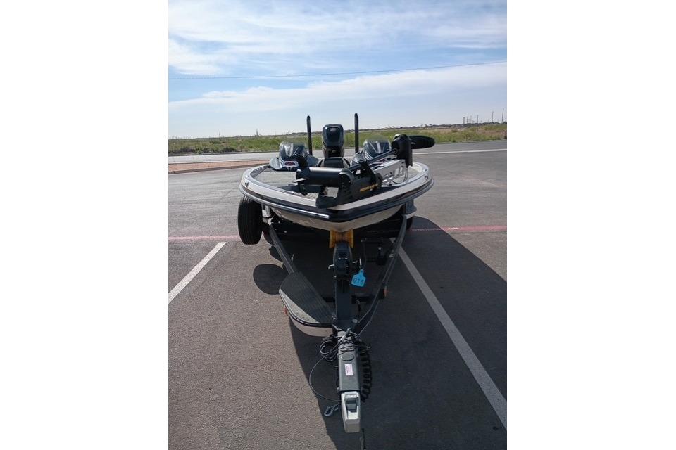 2017 Ranger Z521 Comanche Cup-Equipped boat on trailer in parking lot.