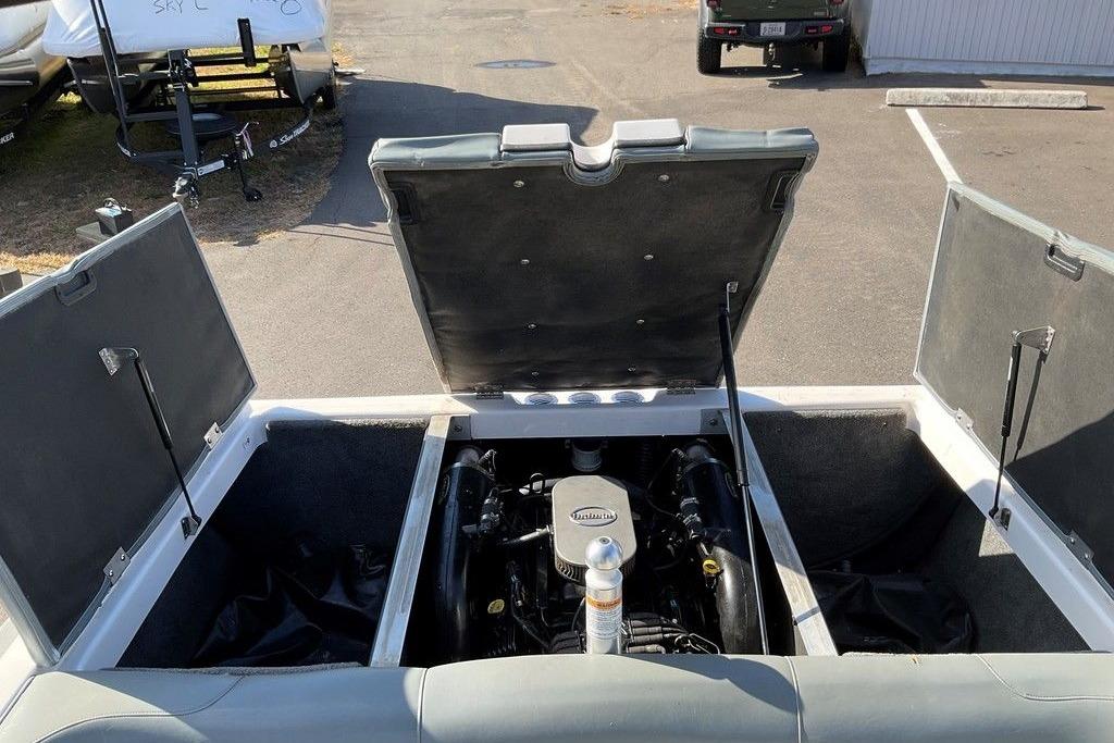 Open engine compartment of 2015 Moomba Outback V boat, showcasing engine details.
