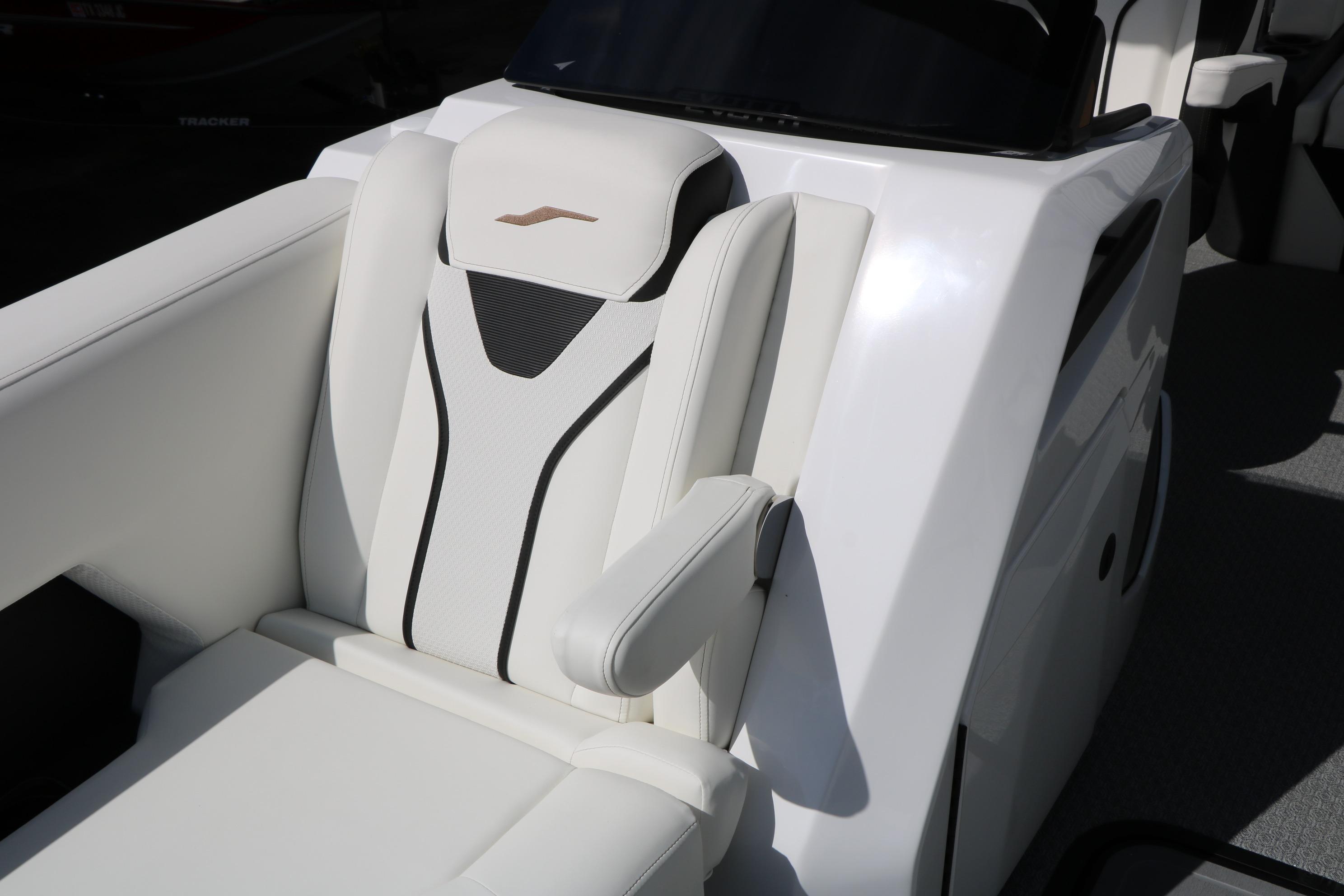 Luxurious seating on 2026 Evotti 725 CS Tri-Toon boat, featuring sleek white upholstery.