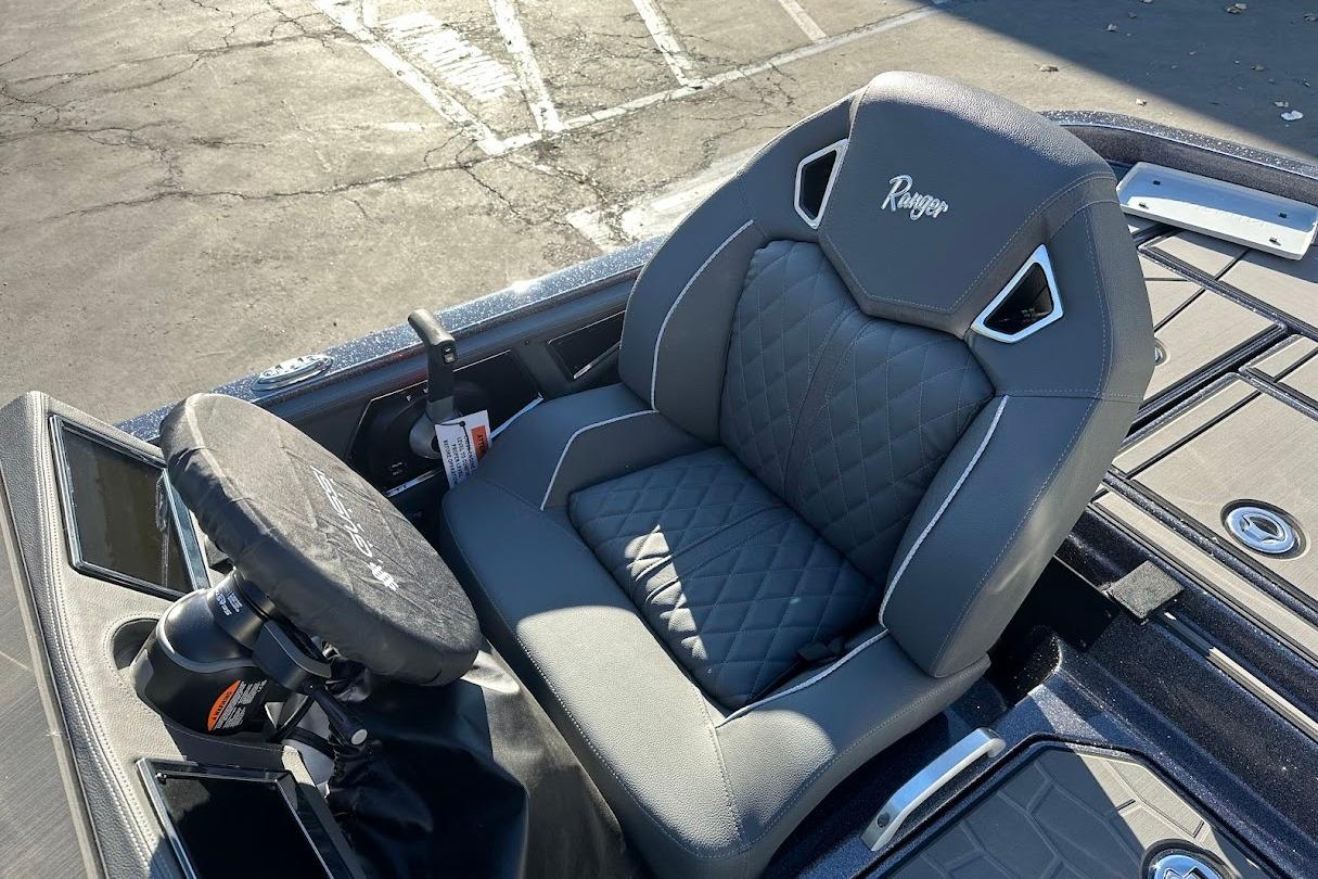 2026 Ranger Z521R Garmin Cup-Equipped boat seat with quilted design and steering wheel cover.
