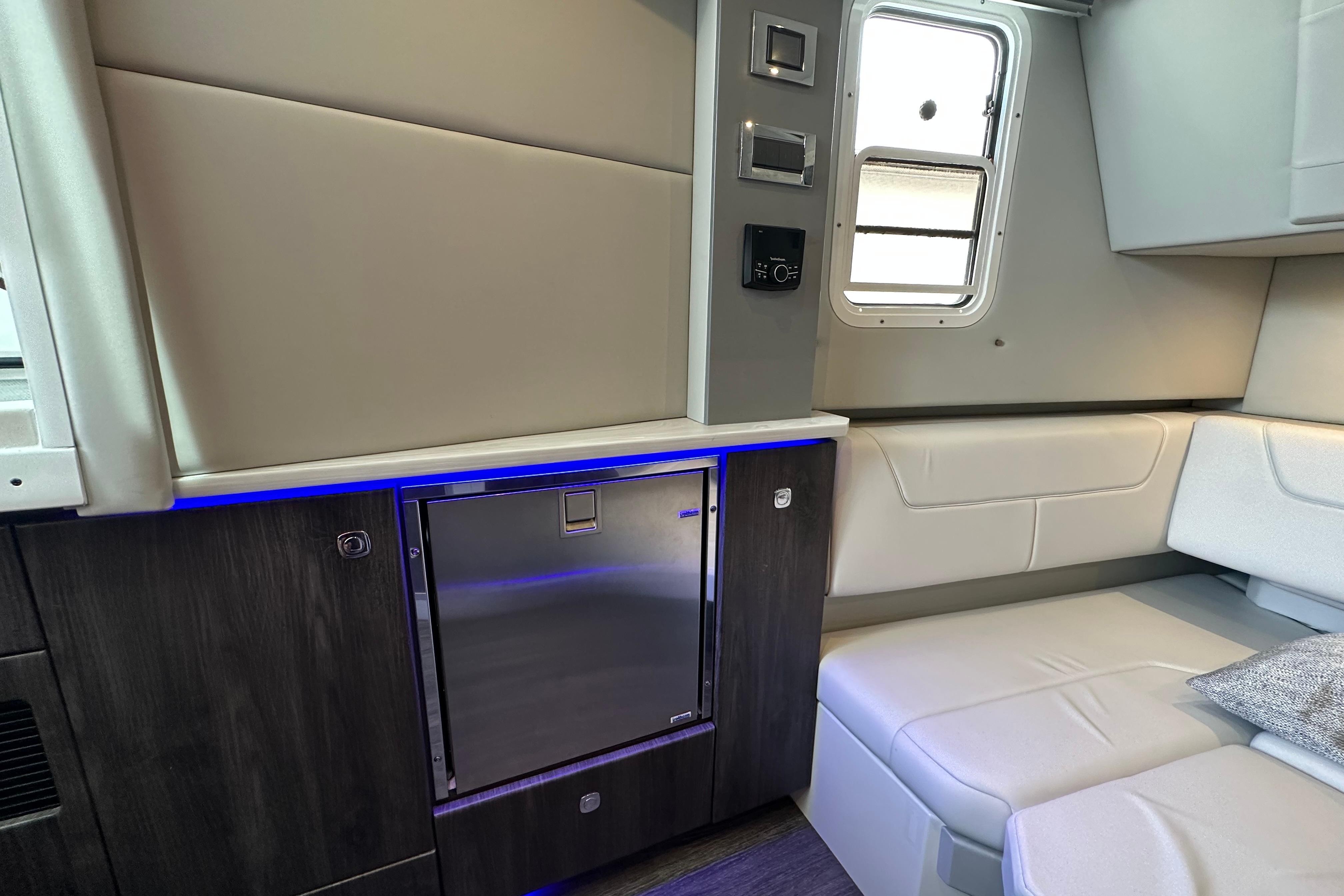 Interior of 2021 Formula 380 Super Sport Crossover OB with modern seating and cabinetry.