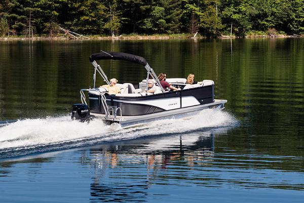 Manufacturer Provided Image: 2023 Crest Classic LX 200 pontoon boat cruising on a serene lake.