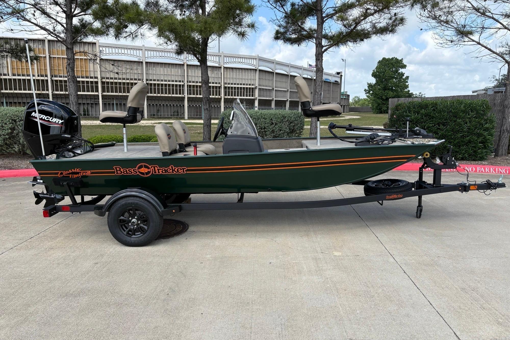 2026 Tracker Bass Tracker Classic Limited boat on trailer, parked outdoors.