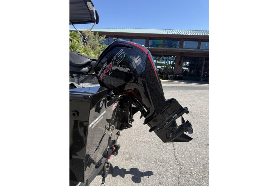 2026 Tracker Pro Guide V-175 Combo boat with Mercury outboard motor in a sunny setting.