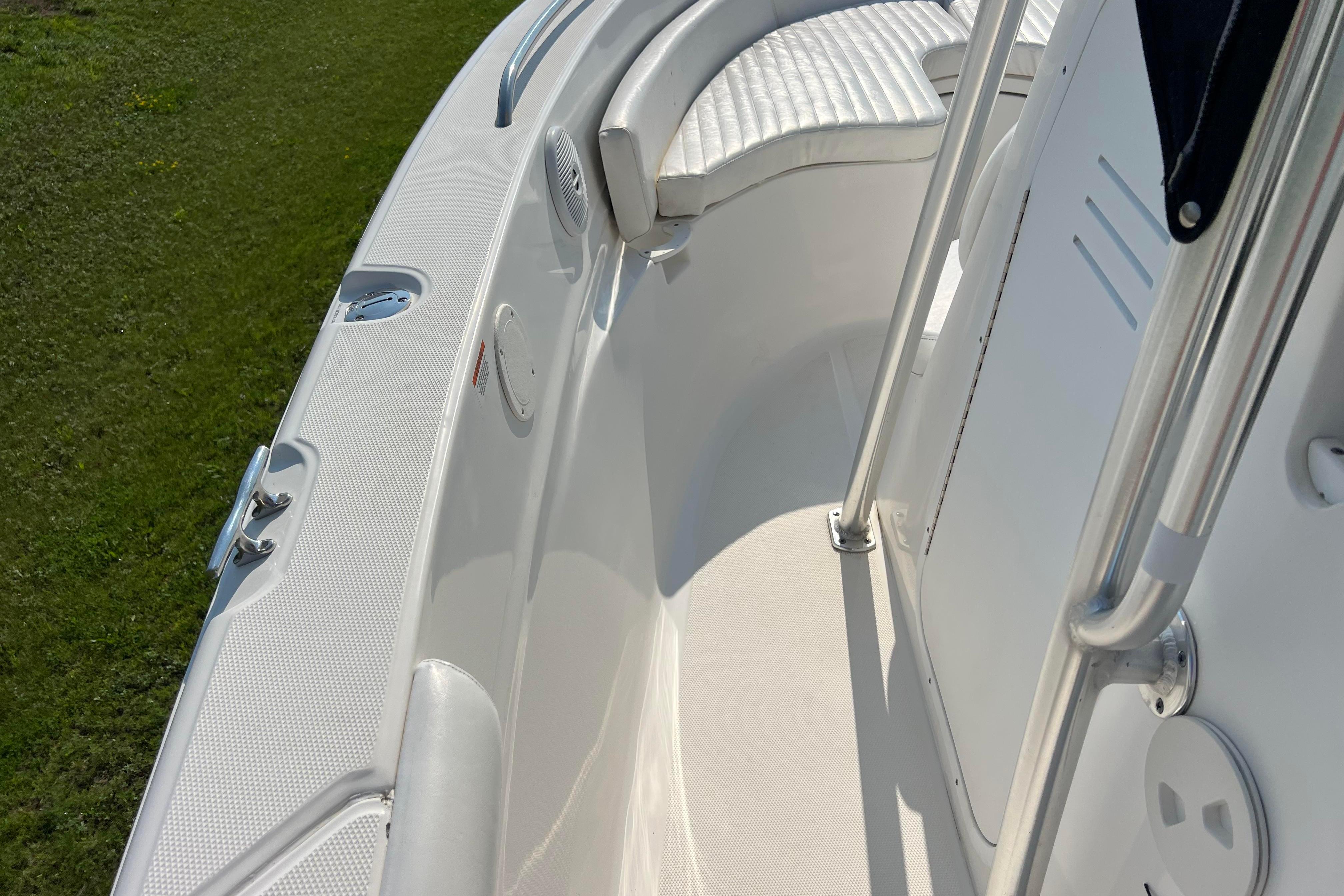 2012 Sea Fox 206 Center Console boat interior with white seating and stainless steel rails.