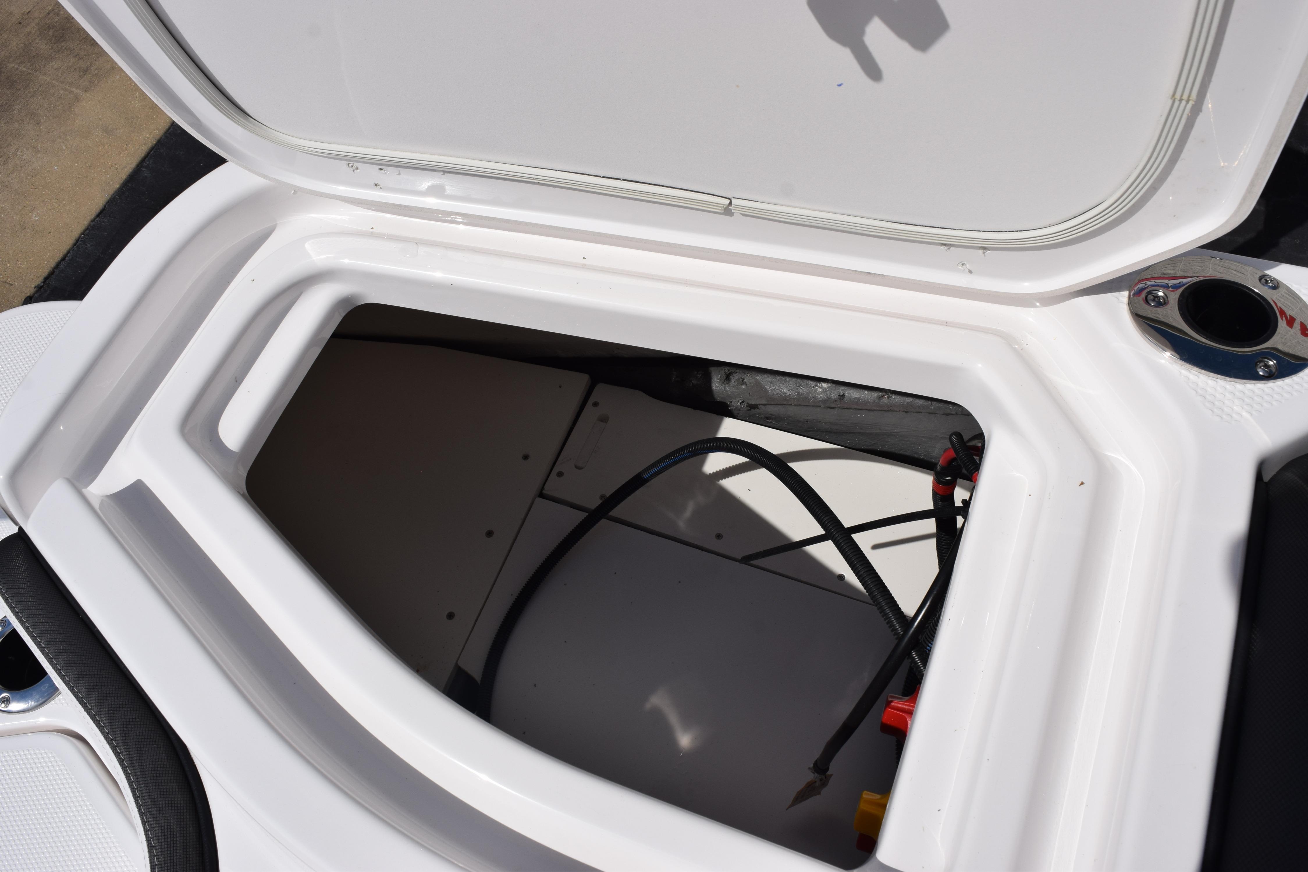 Open storage compartment on 2026 Yamaha Boats 255 FSH Sport H.