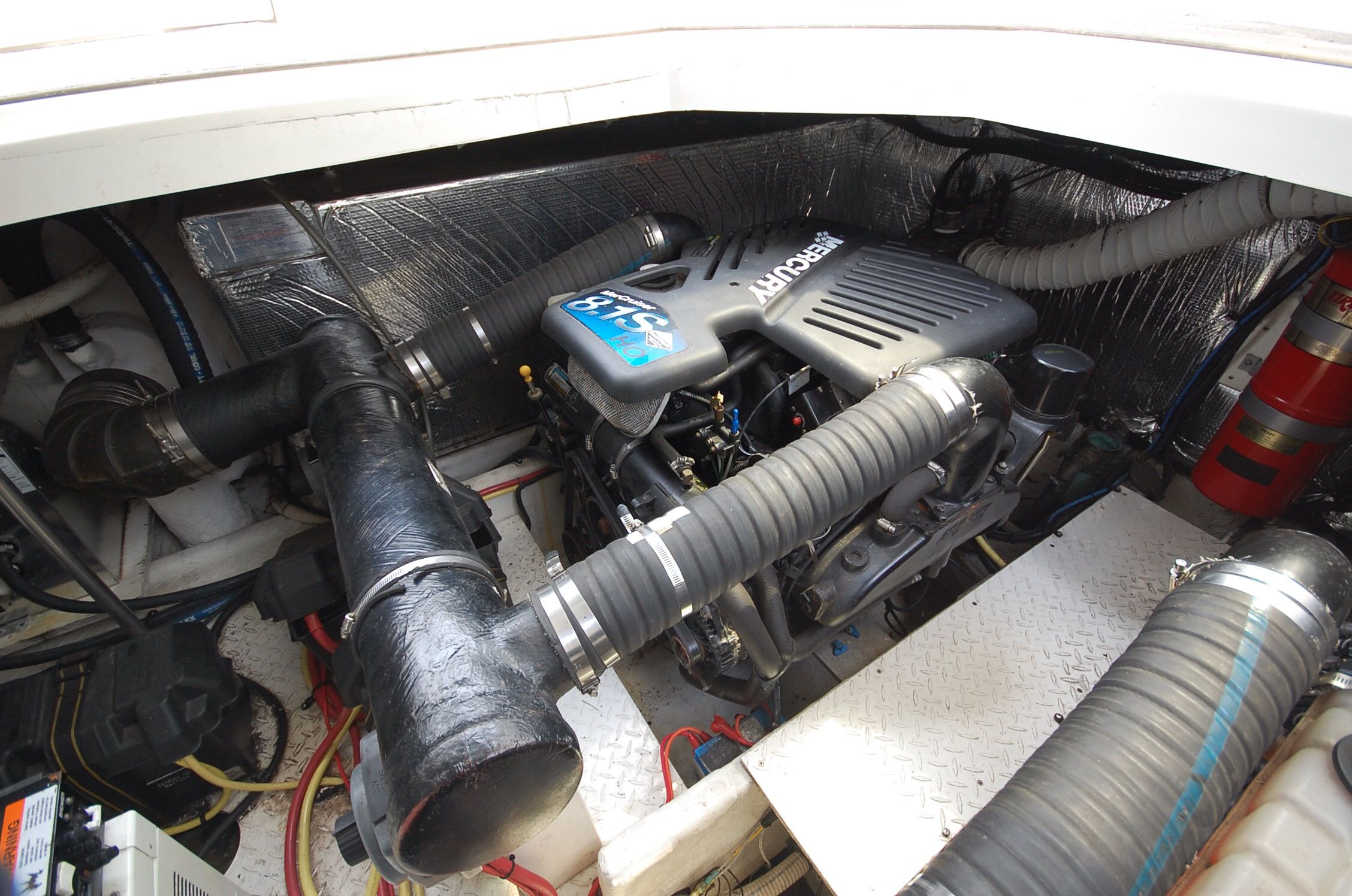 Engine room of 2004 Cruisers Yachts 3970 with MerCruiser 8.1S engine.