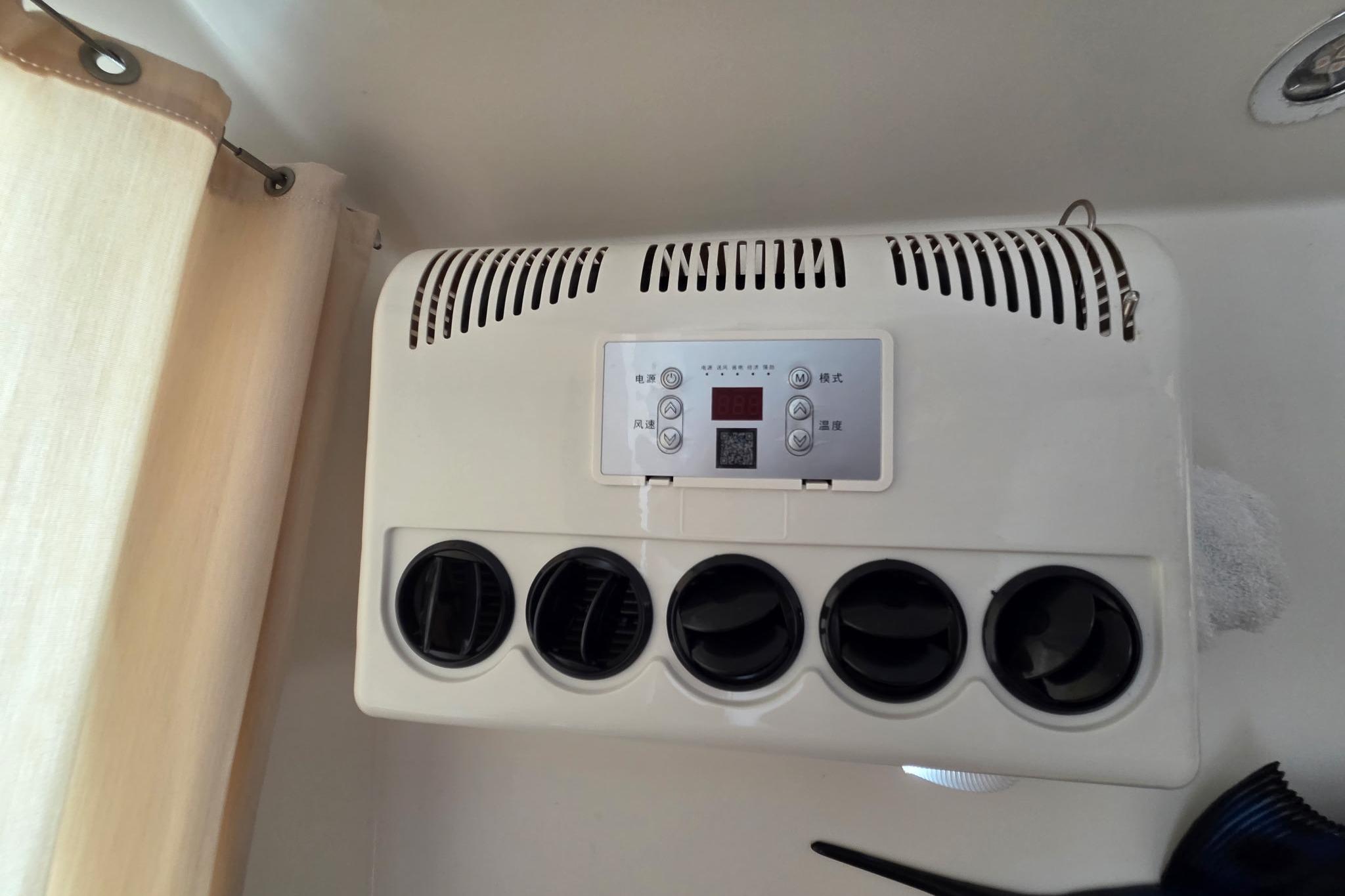 Air conditioning unit inside a 2000 Fountaine Pajot Maryland 37 yacht cabin.