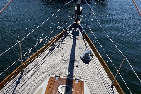 1972 Cheoy Lee Offshore 47 Yawl deck, sailing on calm waters.