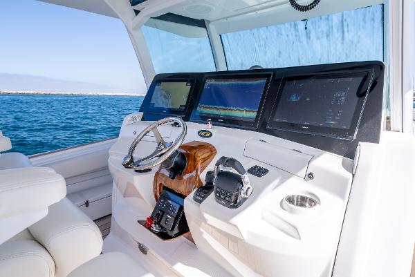 HCB 53 Sueños 2020 boat helm with advanced navigation displays on open water.