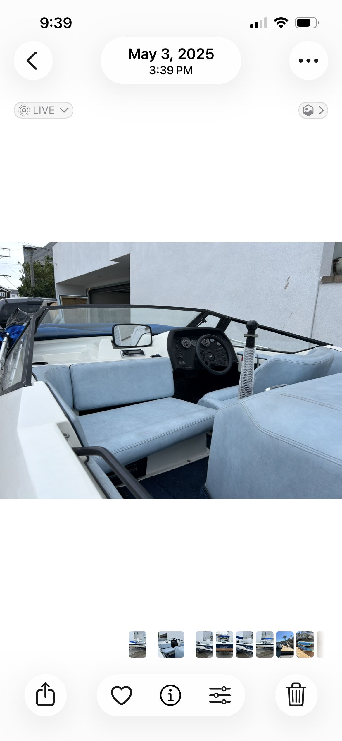 Interior view of a 1987 MasterCraft ProStar 190 with blue seating and dashboard.