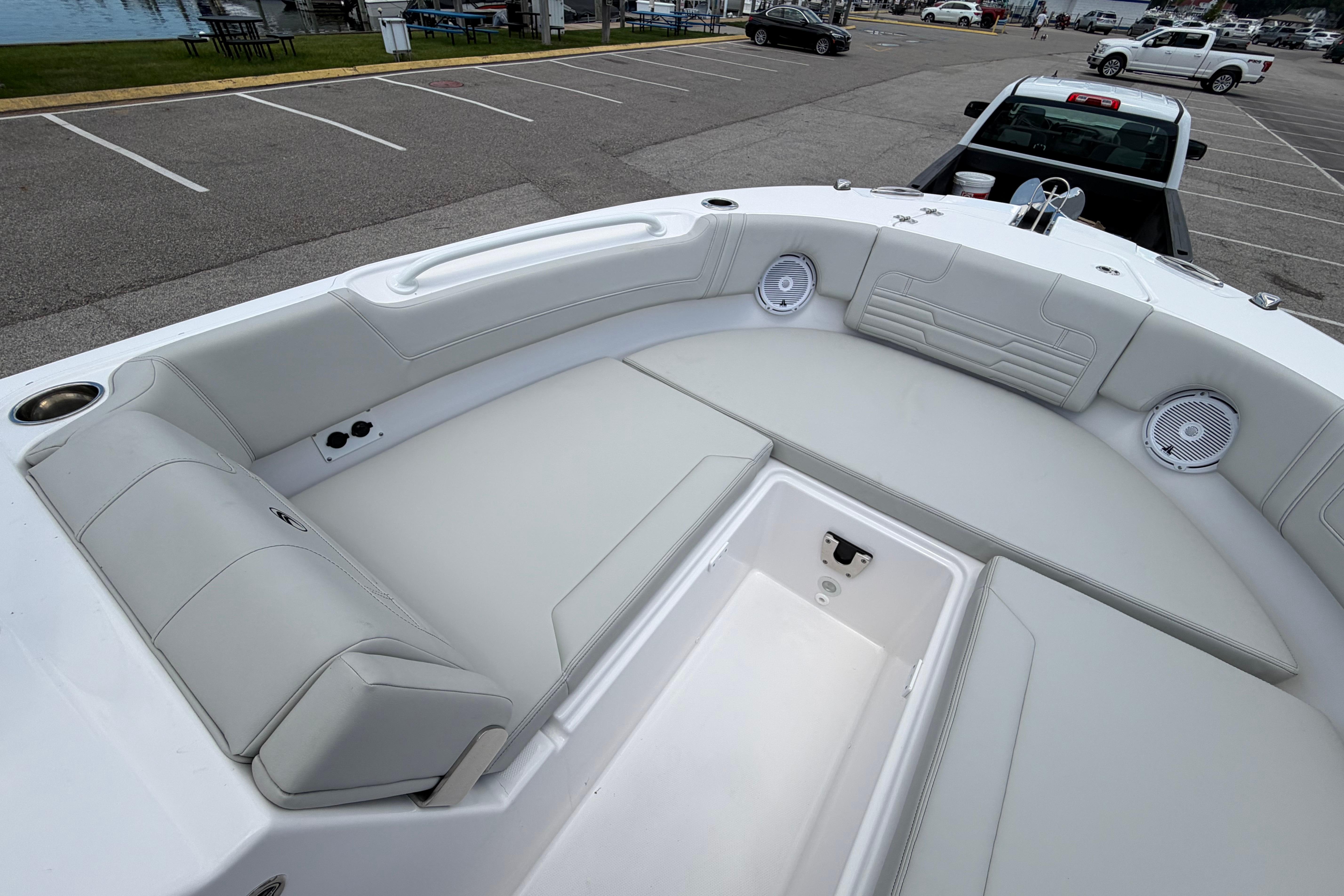 2026 Edgewater 248CX Crossover boat interior with spacious seating and storage.
