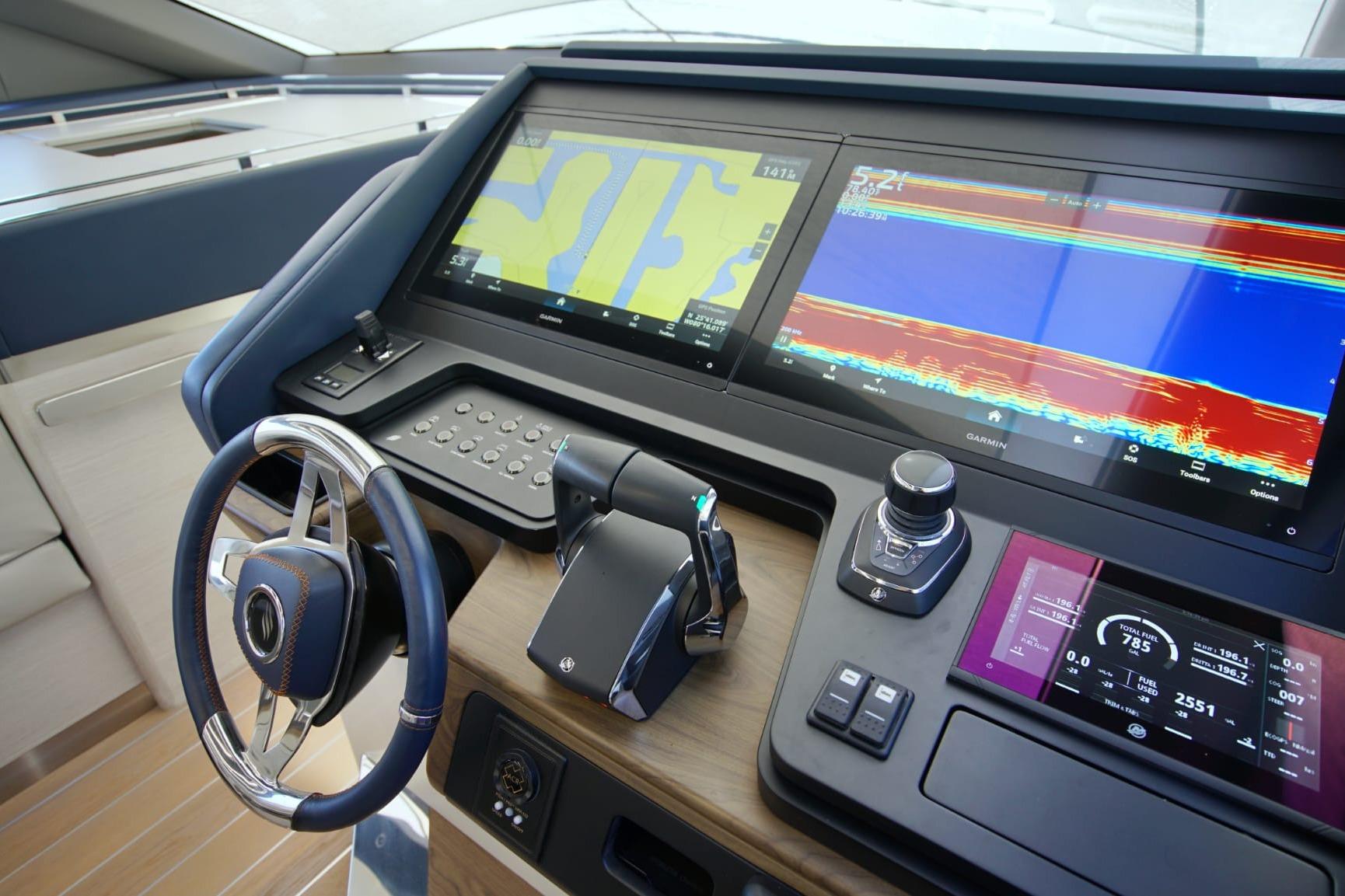 Cockpit of 2024 Uniesse Exuma HTC5p yacht with advanced navigation displays.
