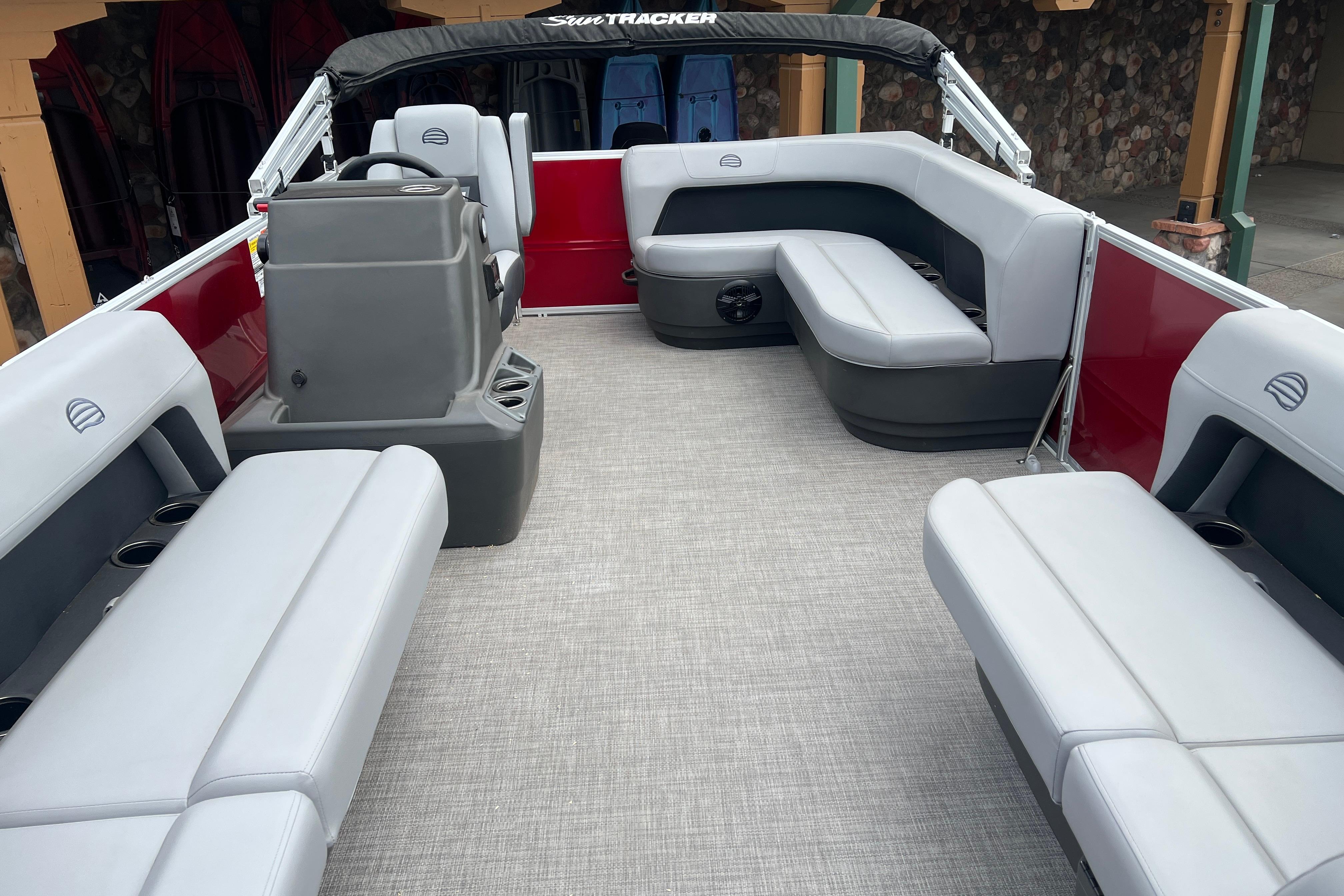 2026 Sun Tracker Party Barge 16 DLX interior with spacious seating and modern design.