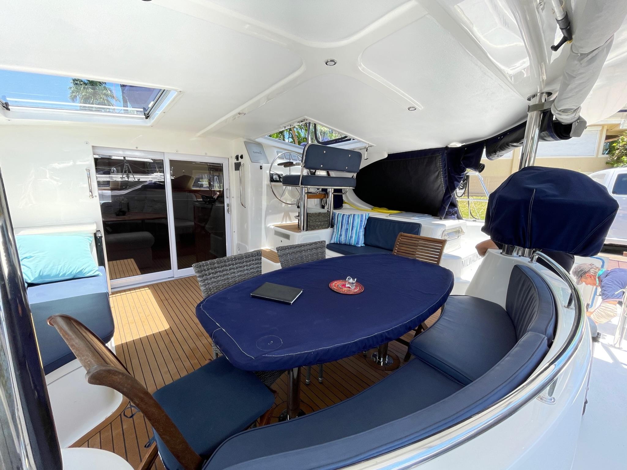 Interior of a 2016 Knysna 500 SE yacht with elegant blue upholstery.