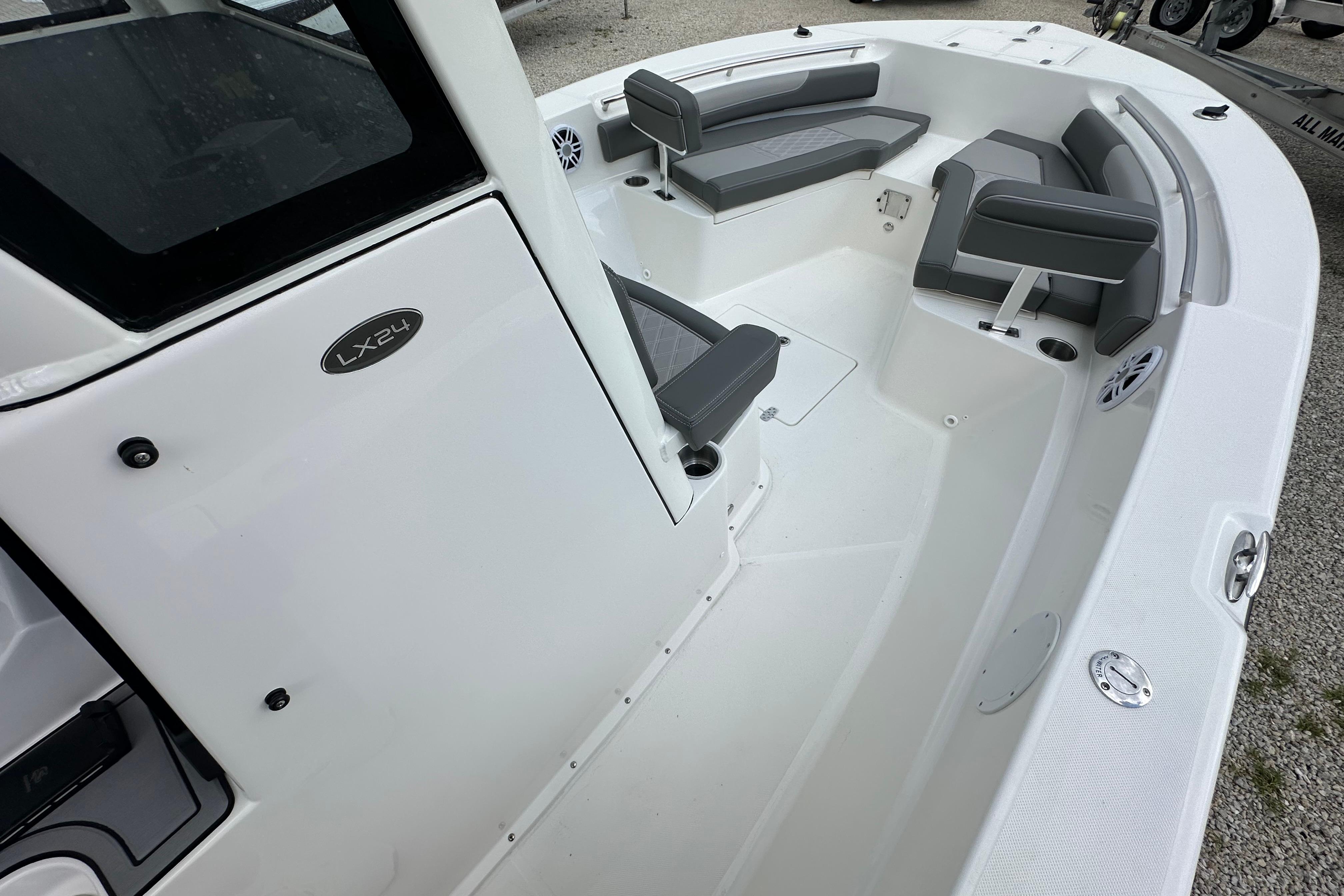 2027 Sea Born LX24 Center Console boat interior with seating and console details.