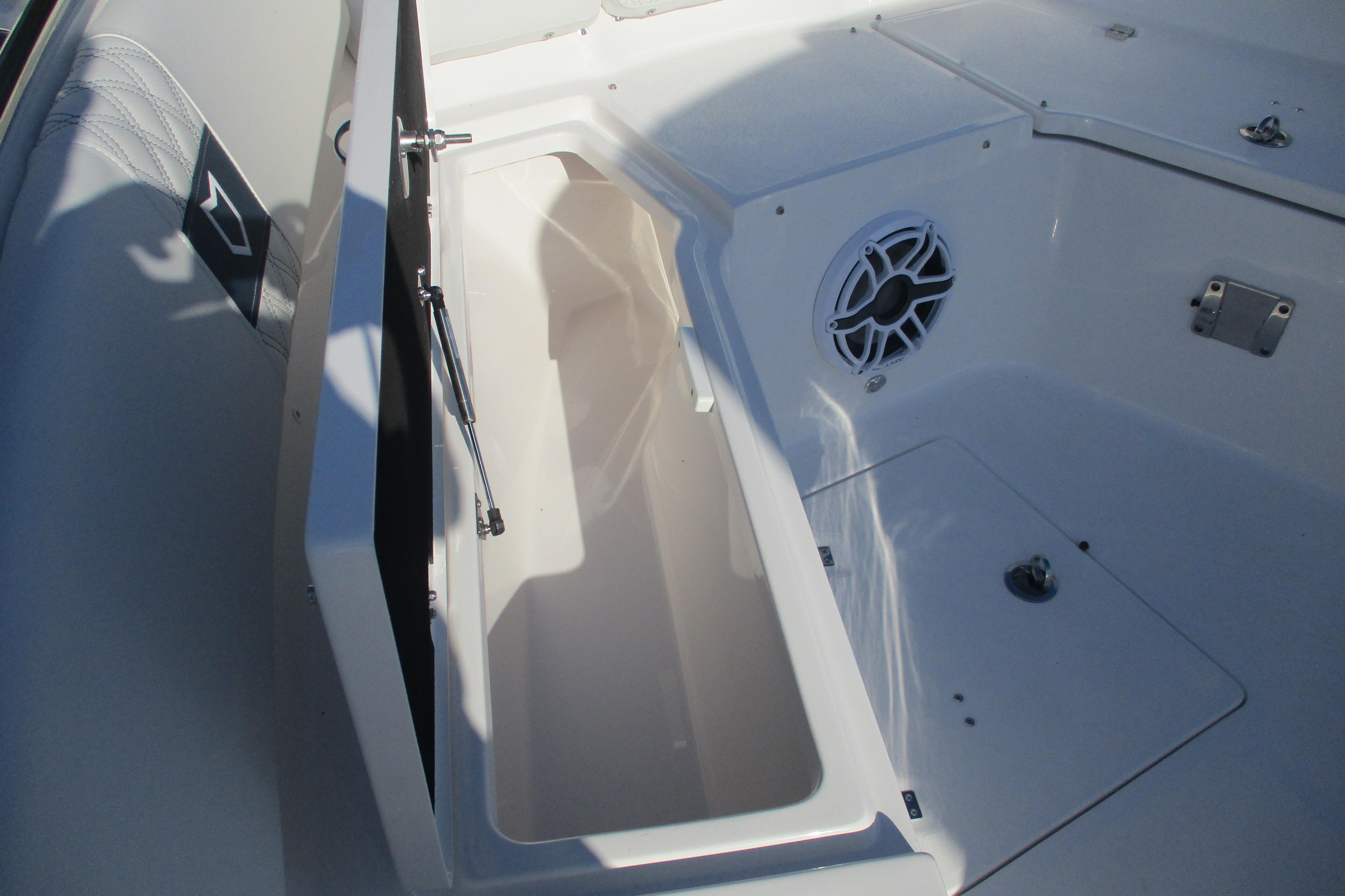 2026 Sea Fox 328 Commander boat storage compartment with speaker detail.