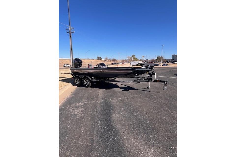 2026 Ranger RT188P boat on trailer in parking lot under clear blue sky.