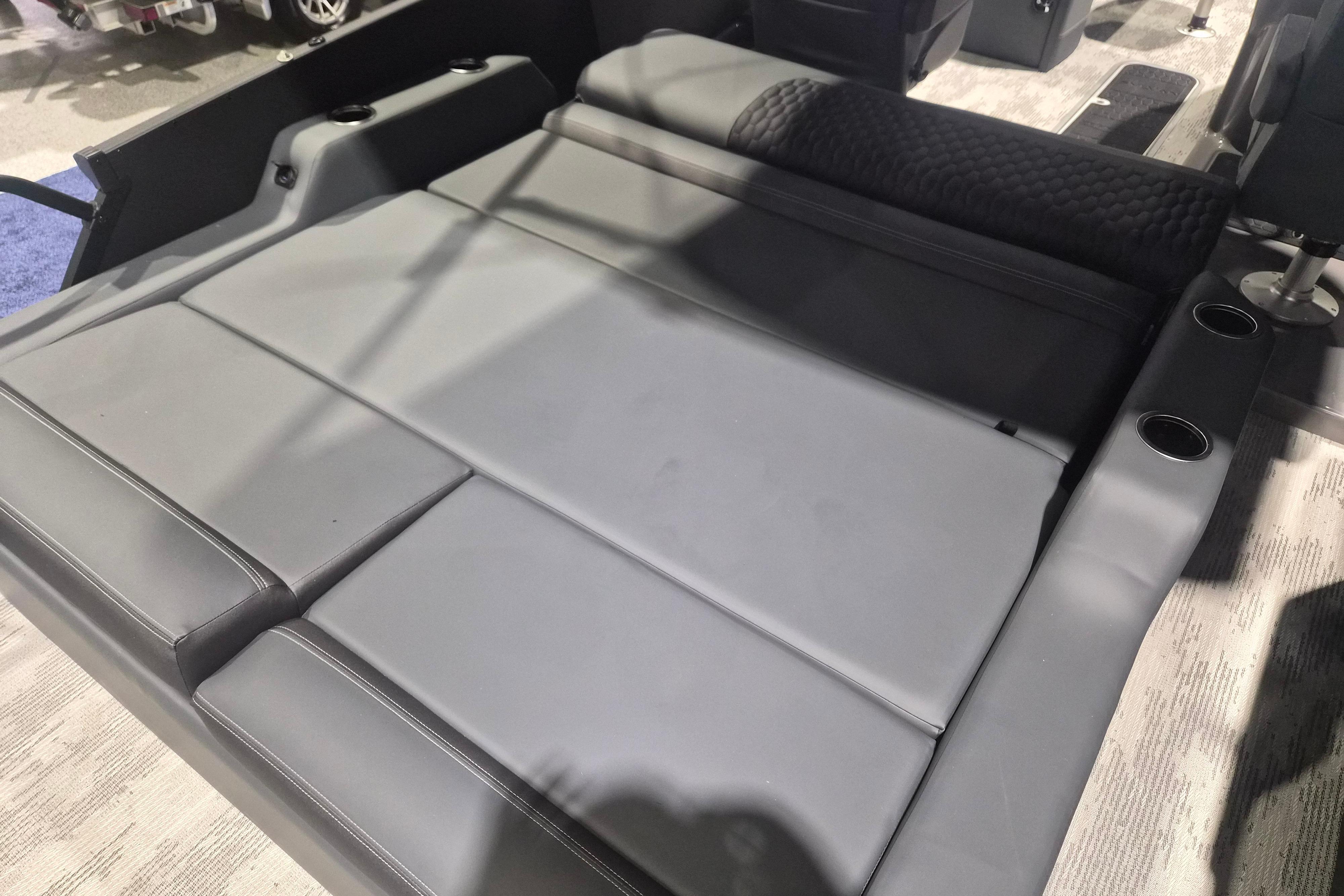 2026 Sylvan L3 ULZ boat interior with sleek gray seating and integrated cup holders.