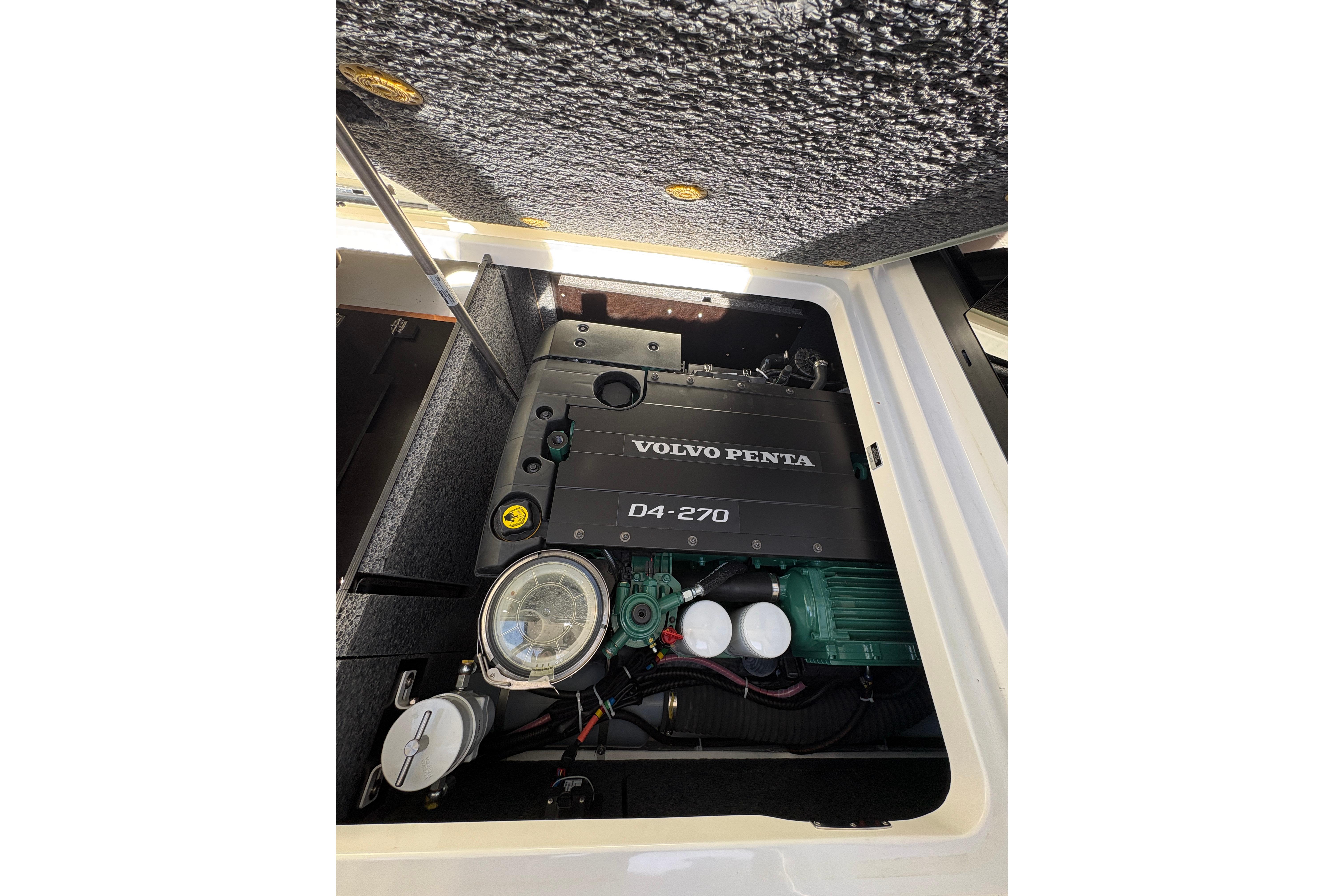 Engine compartment of 2024 Nimbus 305 Coupe featuring Volvo Penta D4-270 engine.
