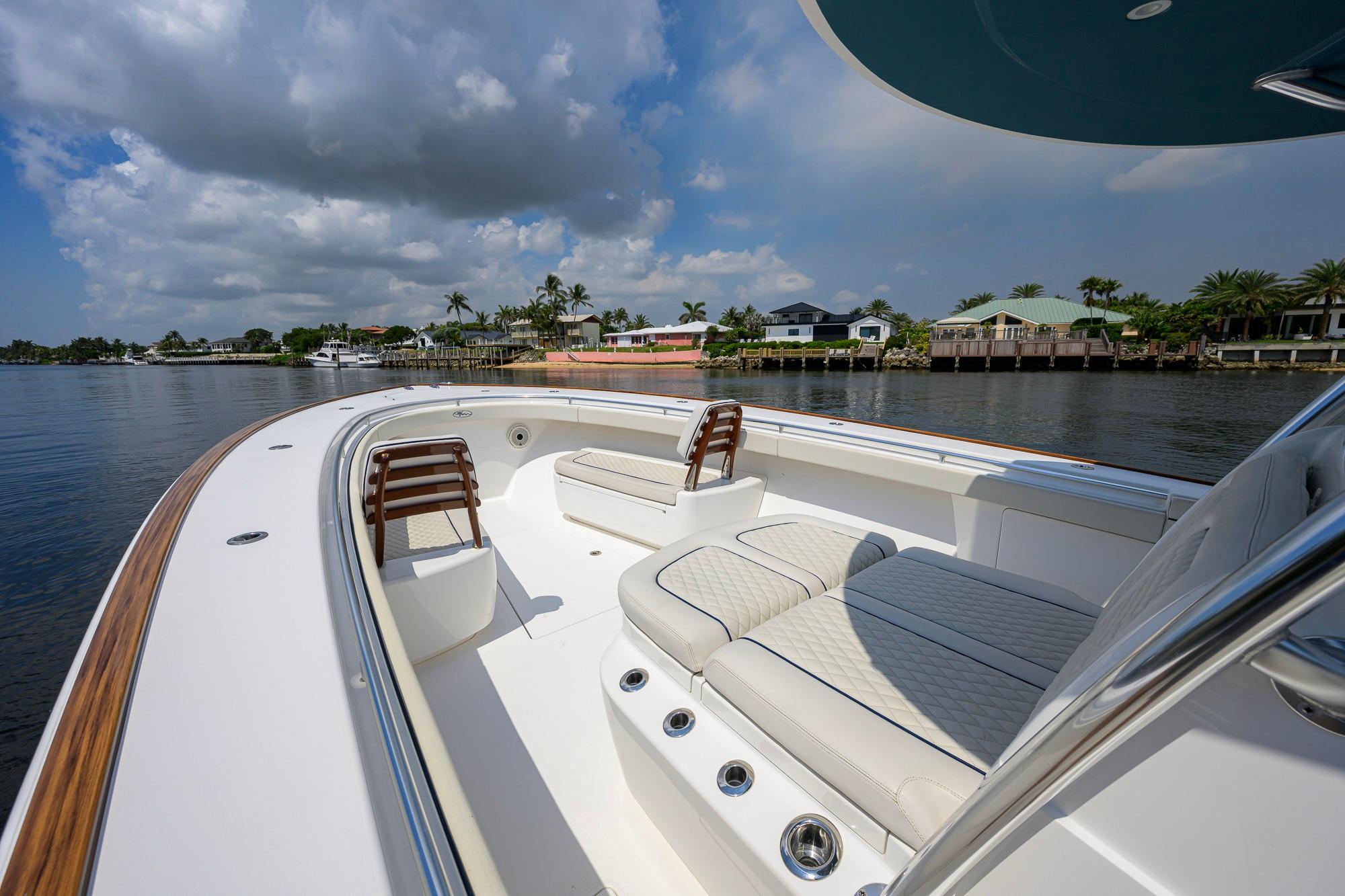 2020 Valhalla Boatworks V-41 on calm water, featuring luxurious seating and sleek design.