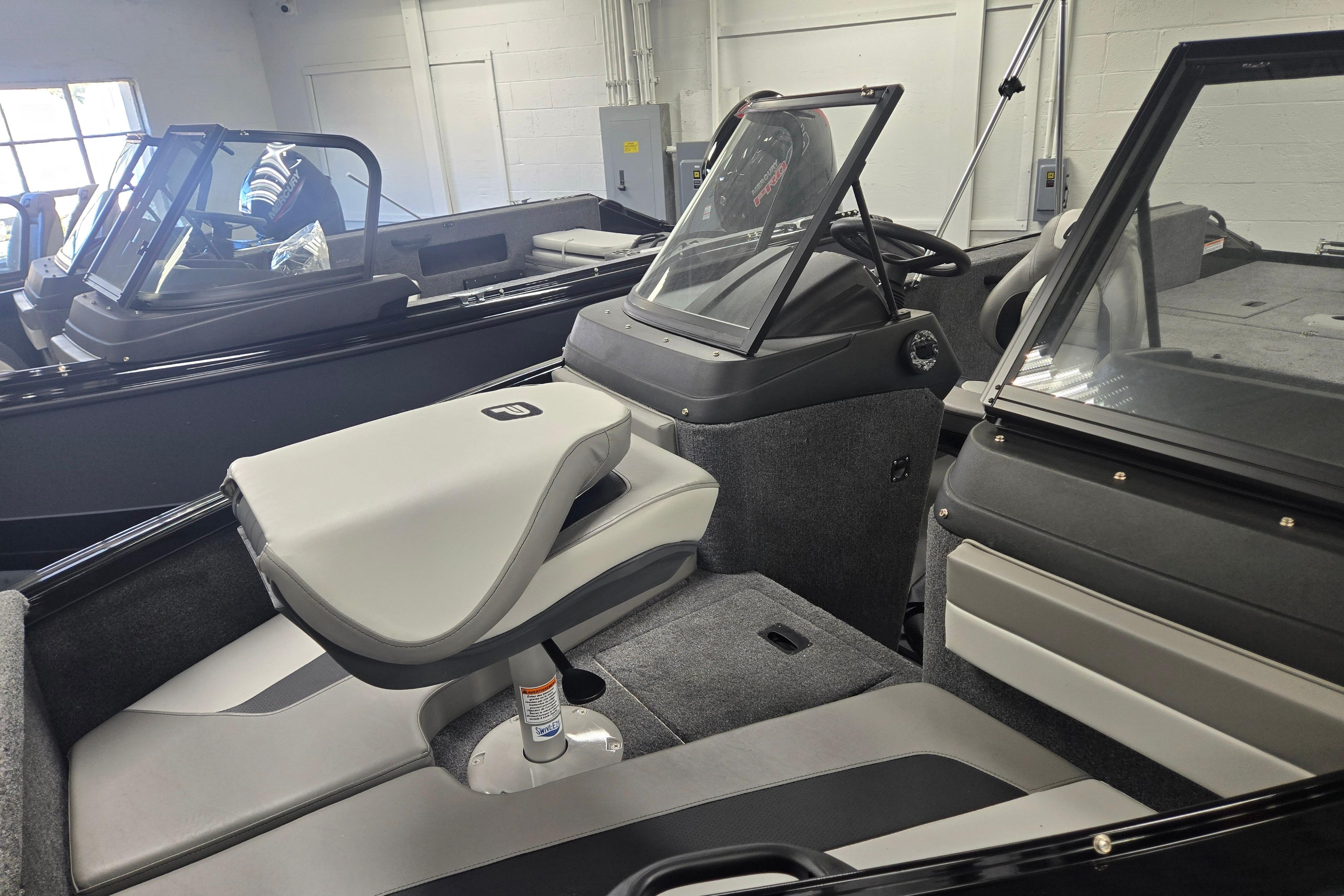 2026 Princecraft Sport 175 MAX boat interior with modern seating and windshield design.