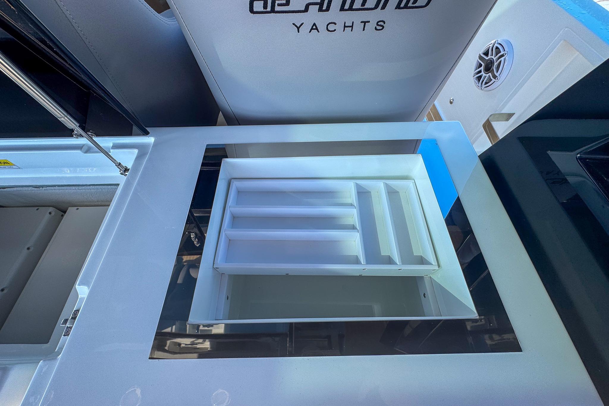 2026 De Antonio Yachts D42 interior storage compartment with sleek design and modern features.