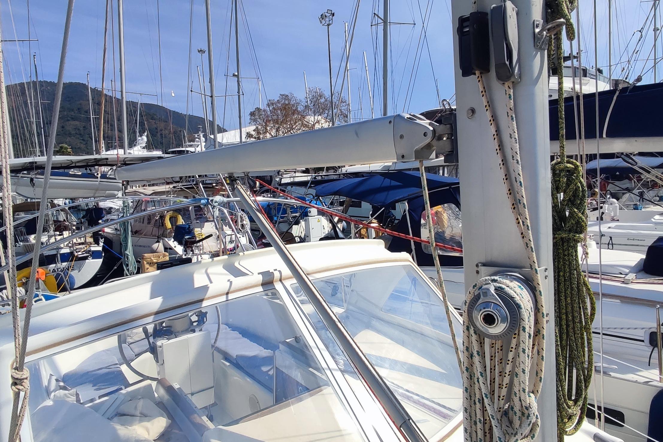 Beneteau Oceanis 36 CC sailboat, 1997 model, docked in a marina with other boats.
