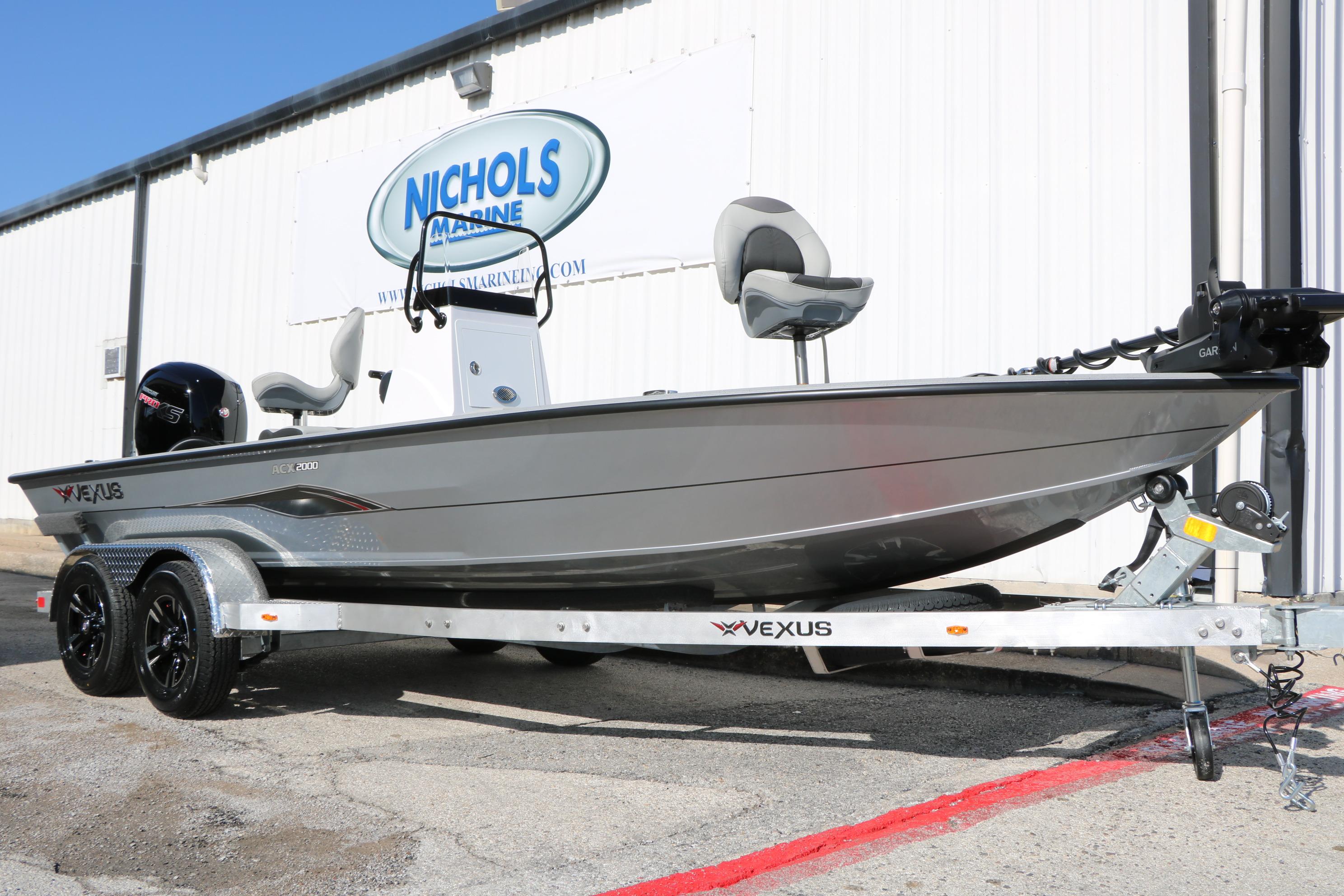 2026 Vexus ACX2000 boat on trailer outside Nichols Marine dealership.