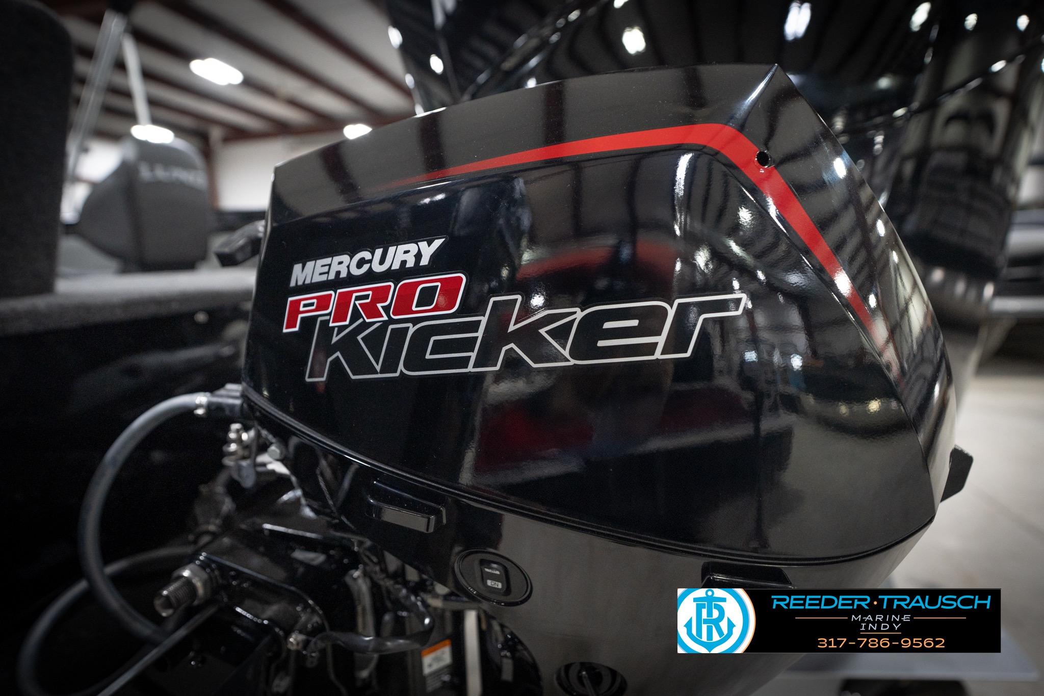 2026 Lund 2275 Baron with Mercury Pro Kicker engine at Reeder-Trausch Marine showroom.