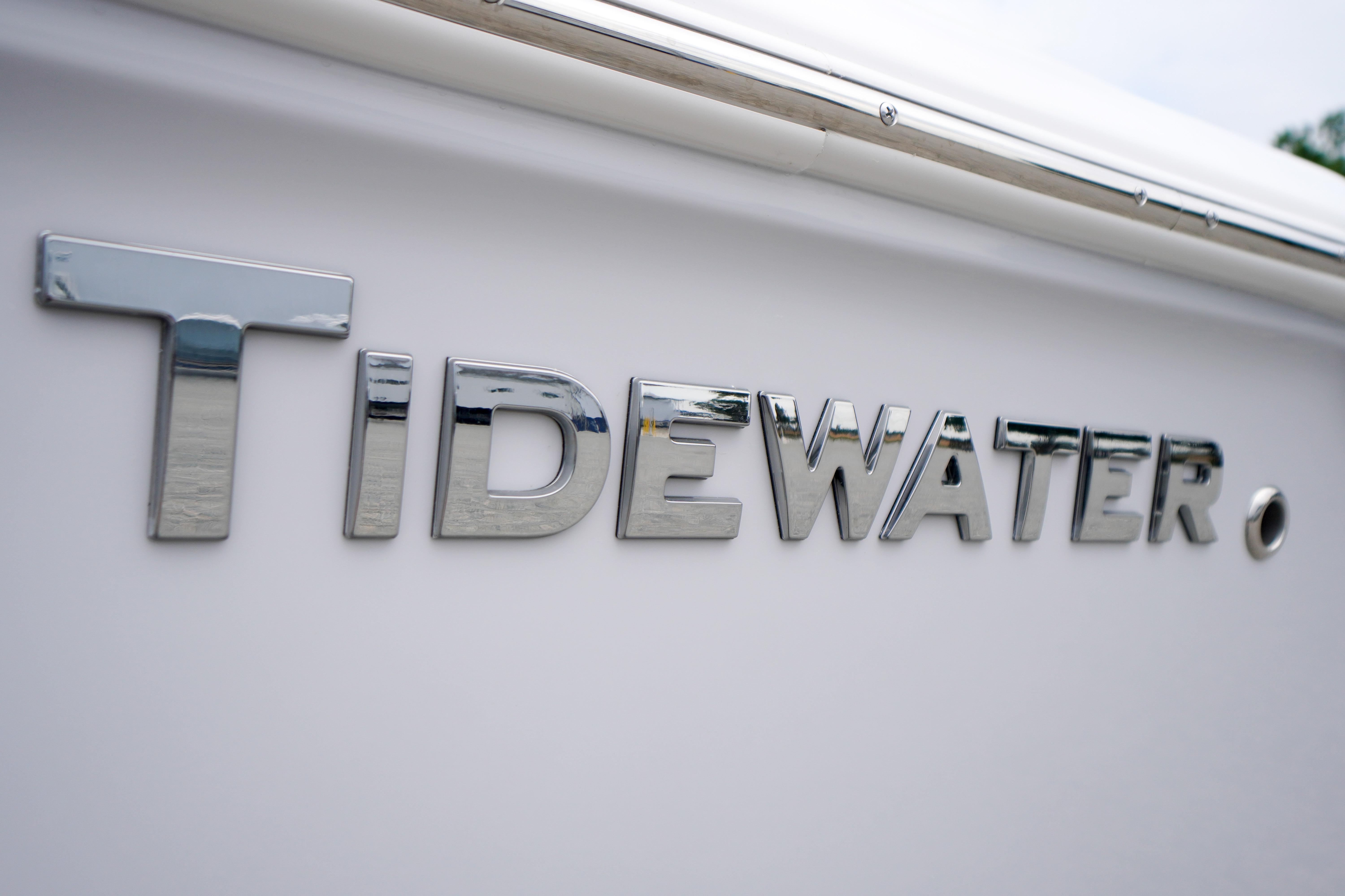 Chrome "Tidewater" logo on 2026 Tidewater 232 SS boat exterior.
